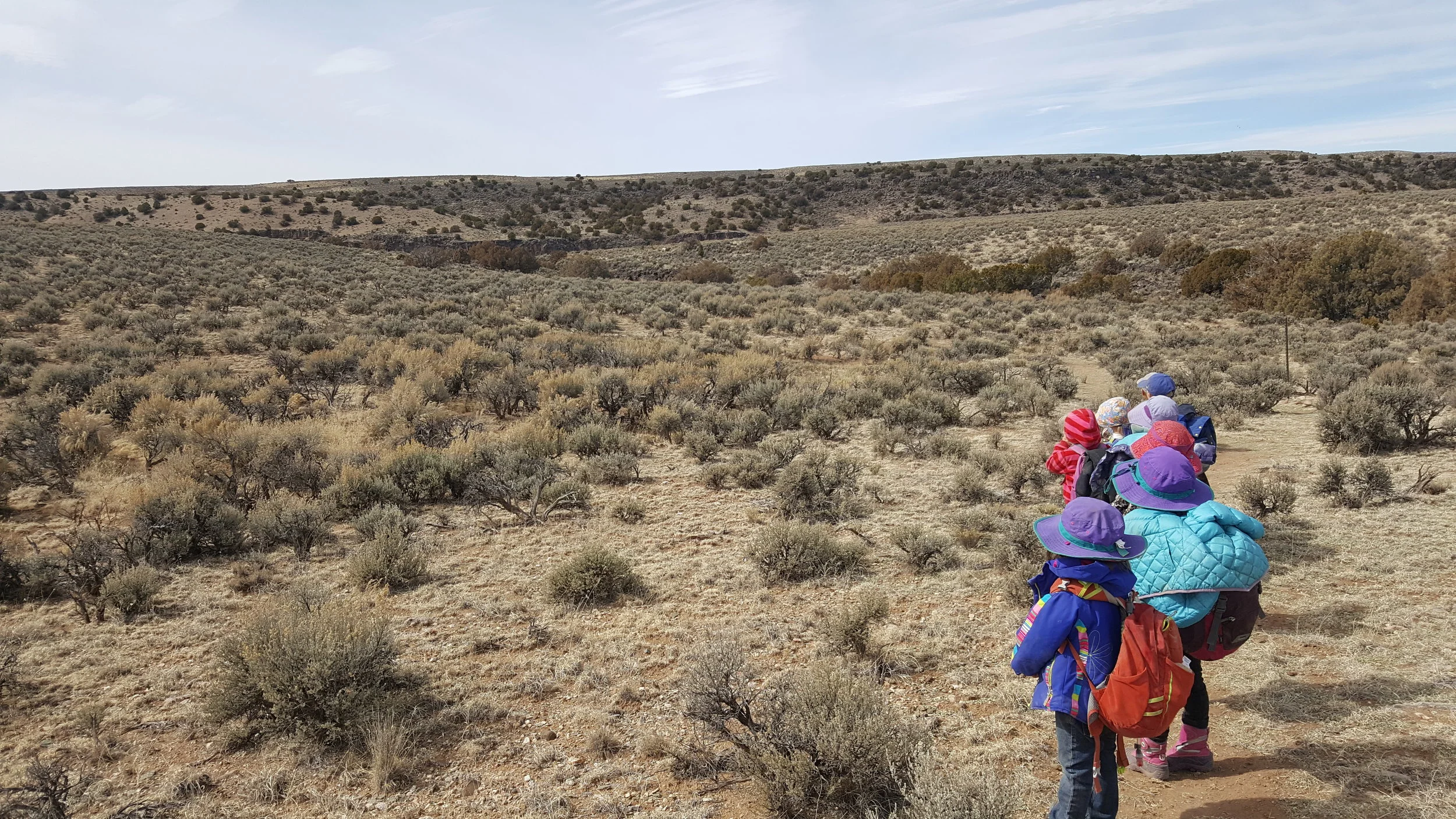 The kids staring at two big horn sheep. They were clear as day in real life, but the photo makes them so small you don't even see them. Oh well.