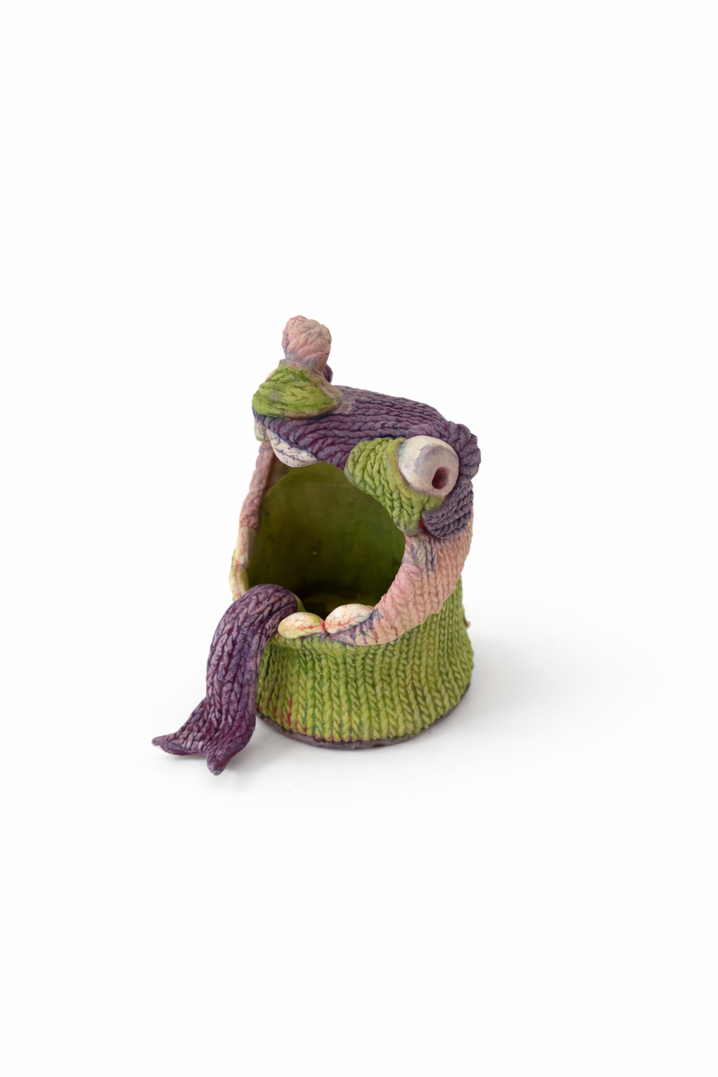 Whimsical ceramic monster planter.png