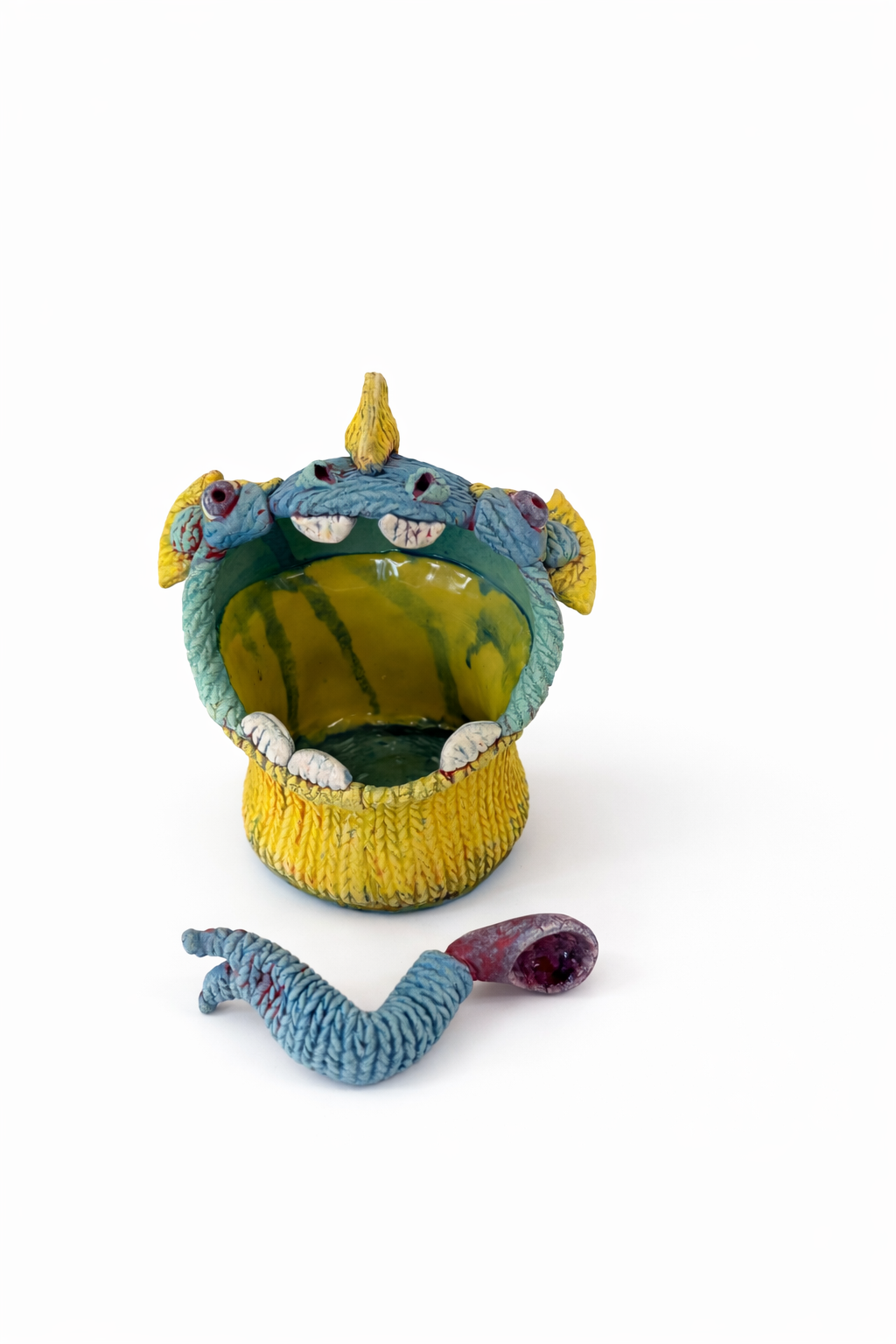 Monster planter with curled tail.png