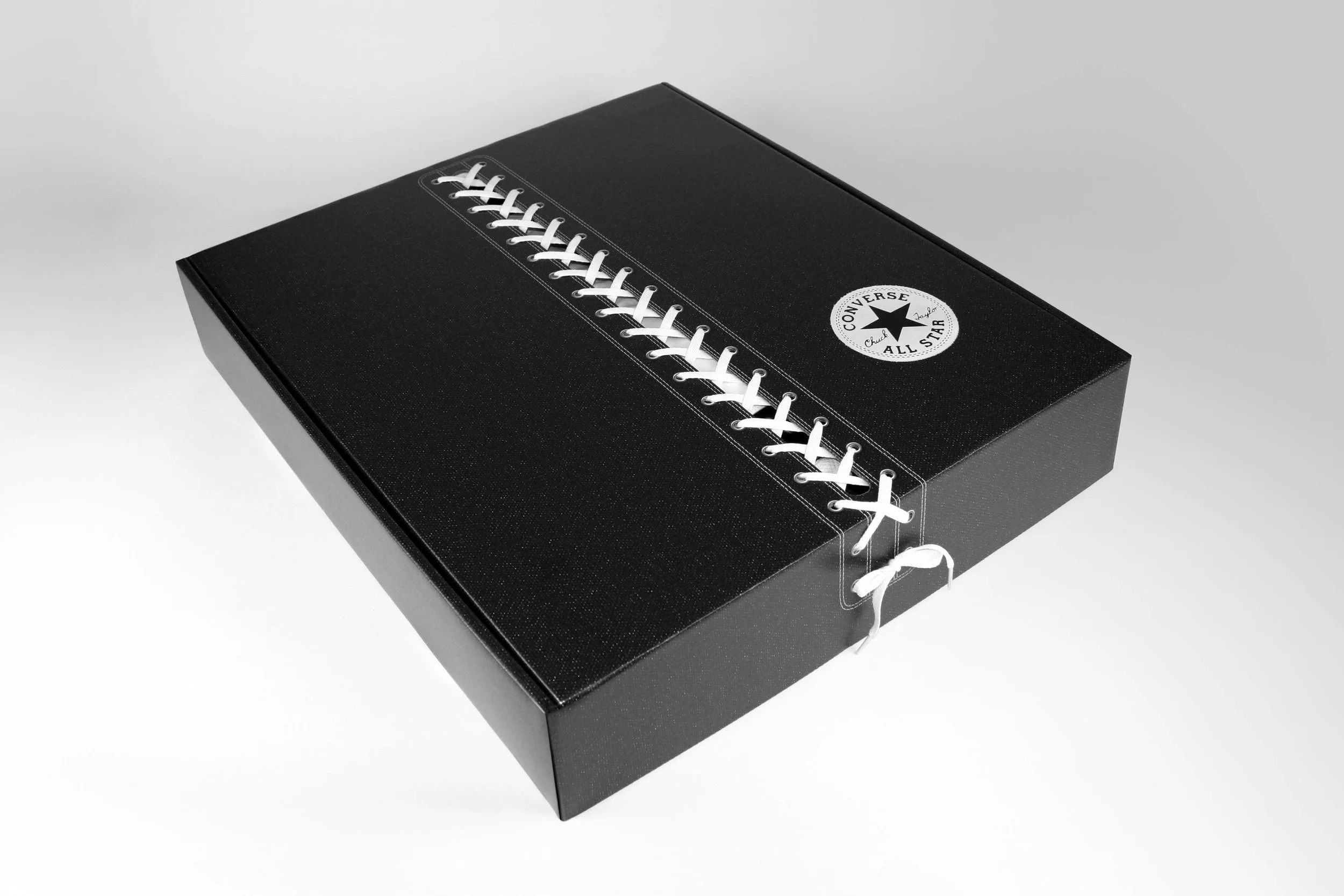  Black Converse XXHI Influencer Kit with actual shoe laces lacing up box. 