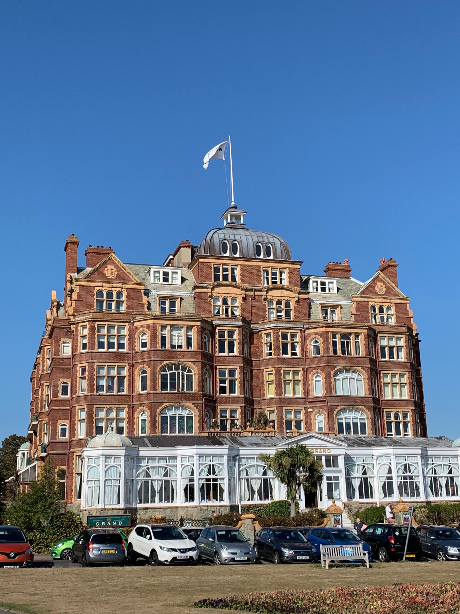 The Grand hotel . Folkestone was really rocking in Victorian times. King Edward 7th used to stay here with his mistress Alice Keppel, and sometimes the queen, as well. You can still rent a room and/or dine here and they offer tours on Fridays. At the very top, a light blinks ‘Earth Peace’ in Morse code. This is an art installation by Yoko Ono.