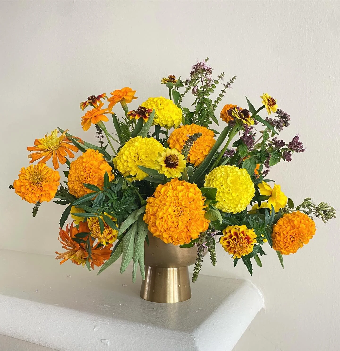 When the summer heat sizzles, nothing brightens the day like homegrown marigolds and fiery orange zinnias! 🔥🌼
Snipped straight from the garden, this cheerful bunch brings warmth, color, and a whole lot of joy to any space &mdash; proof that even in