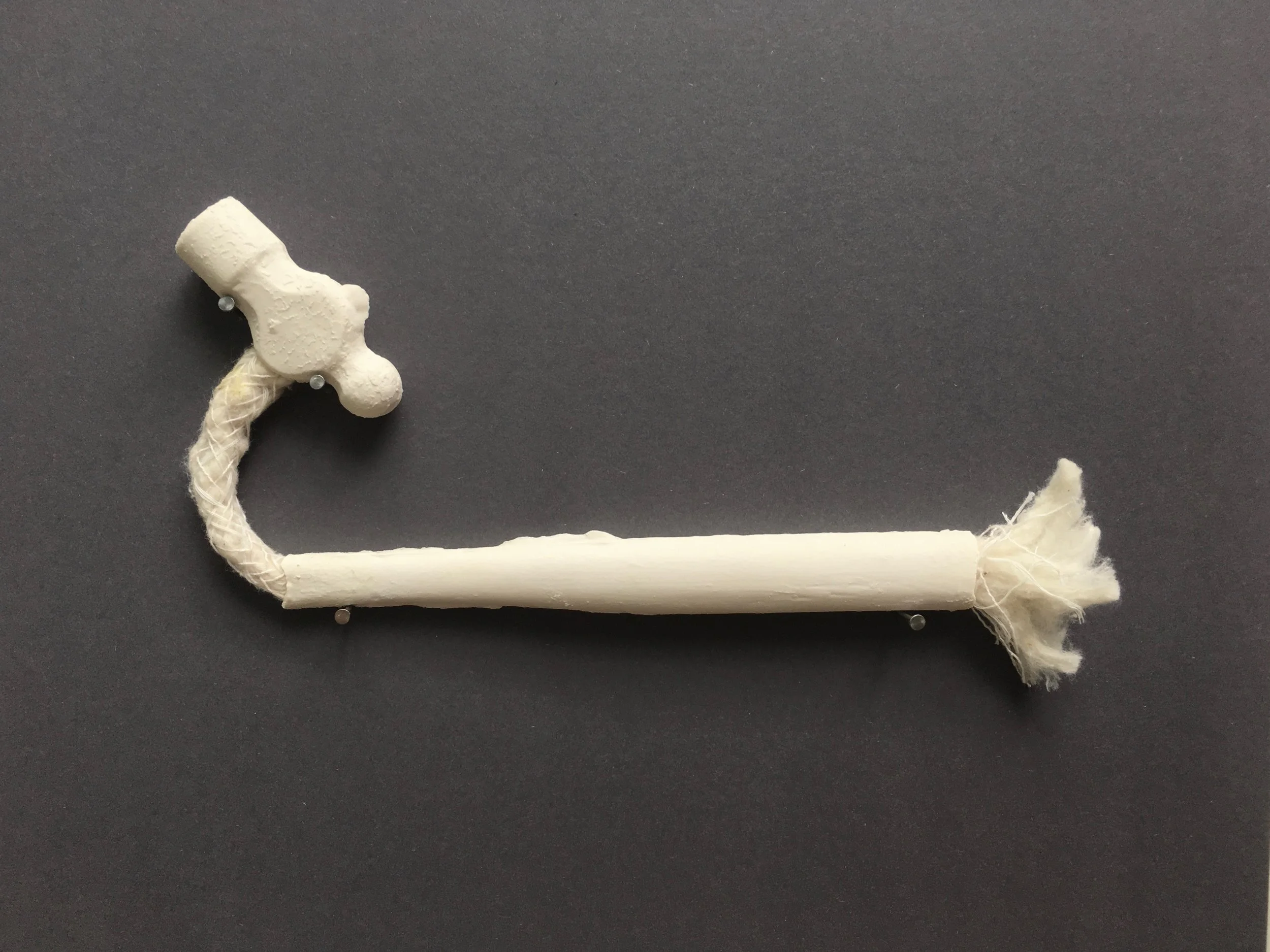 Porcelain, cotton wick, nails