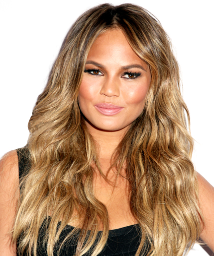  Tape in extensions on my client Chrissy Teigen add length, color, and fullness. Extensions by Priscilla Valles. 