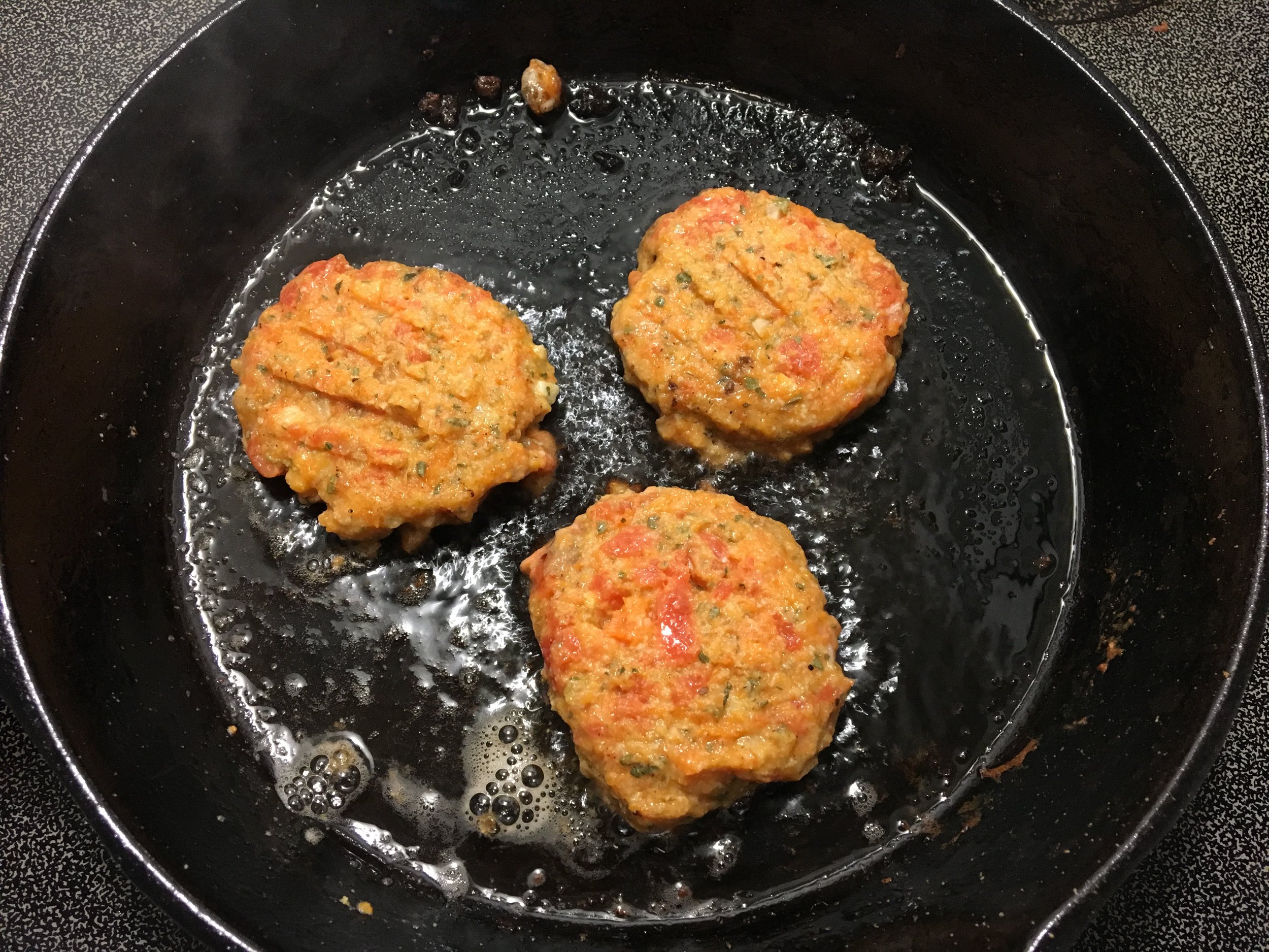 Frying up some sweet potato salmon cakes in coconut oil!