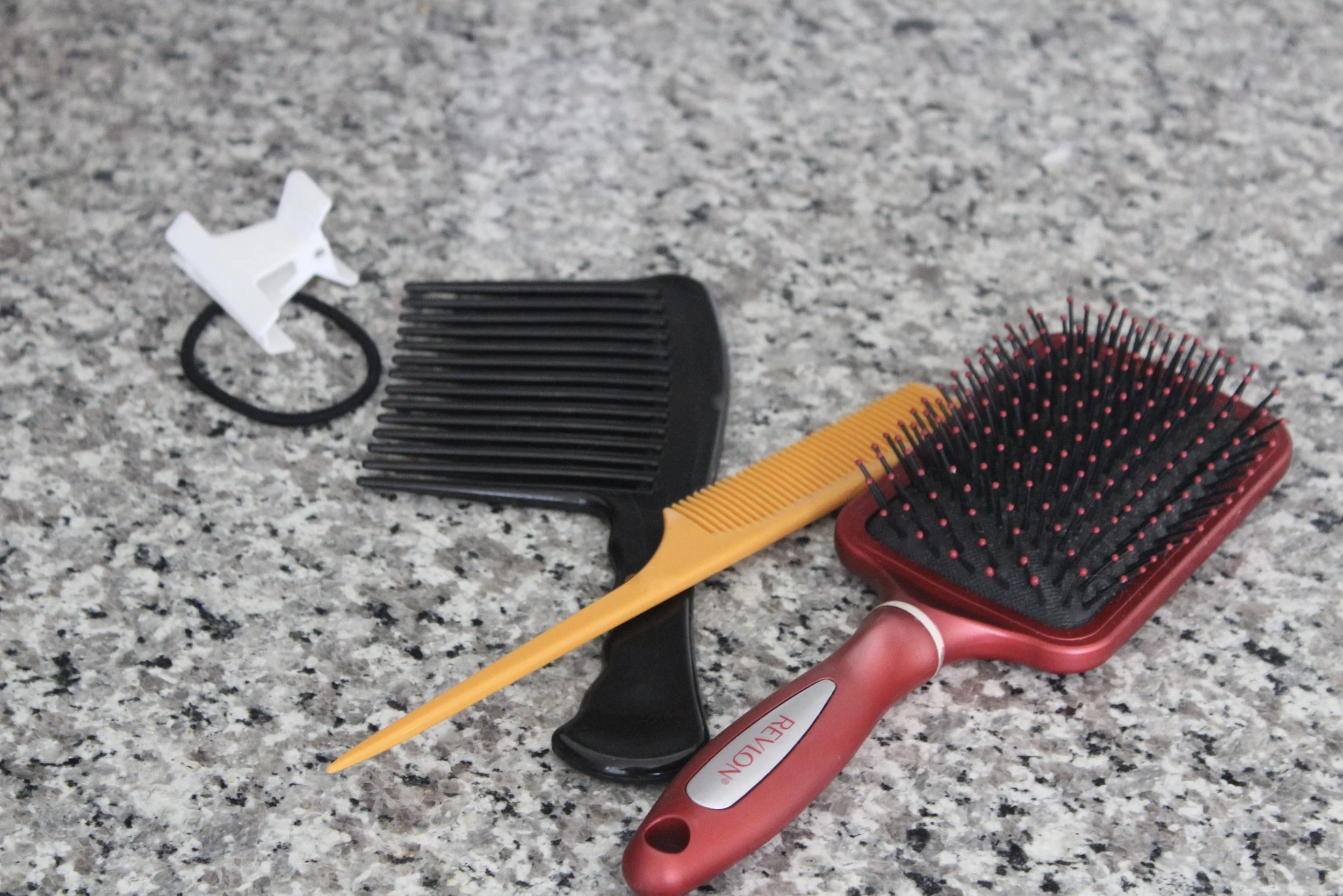 Tip: Use the big tooth comb to detangle, the rat tail to part (and flat iron), and the brush to blow dry. 