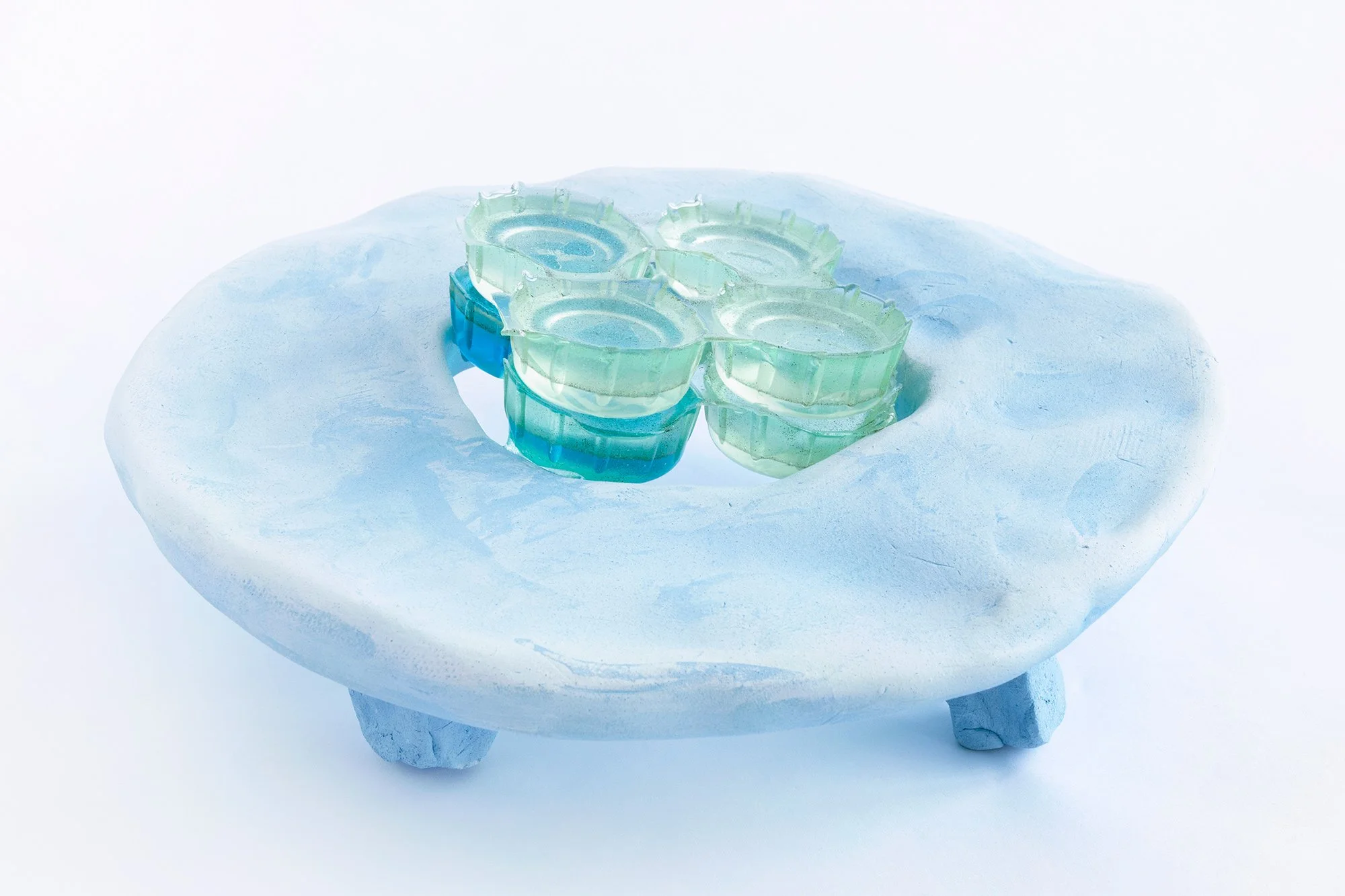   Yi Xin Tong,  Observation Station , 2022, Blue clay bisqueware, epoxy resin, pigment, 8 x 8 x 3 inches. Photo credit: Kunning Huang.  