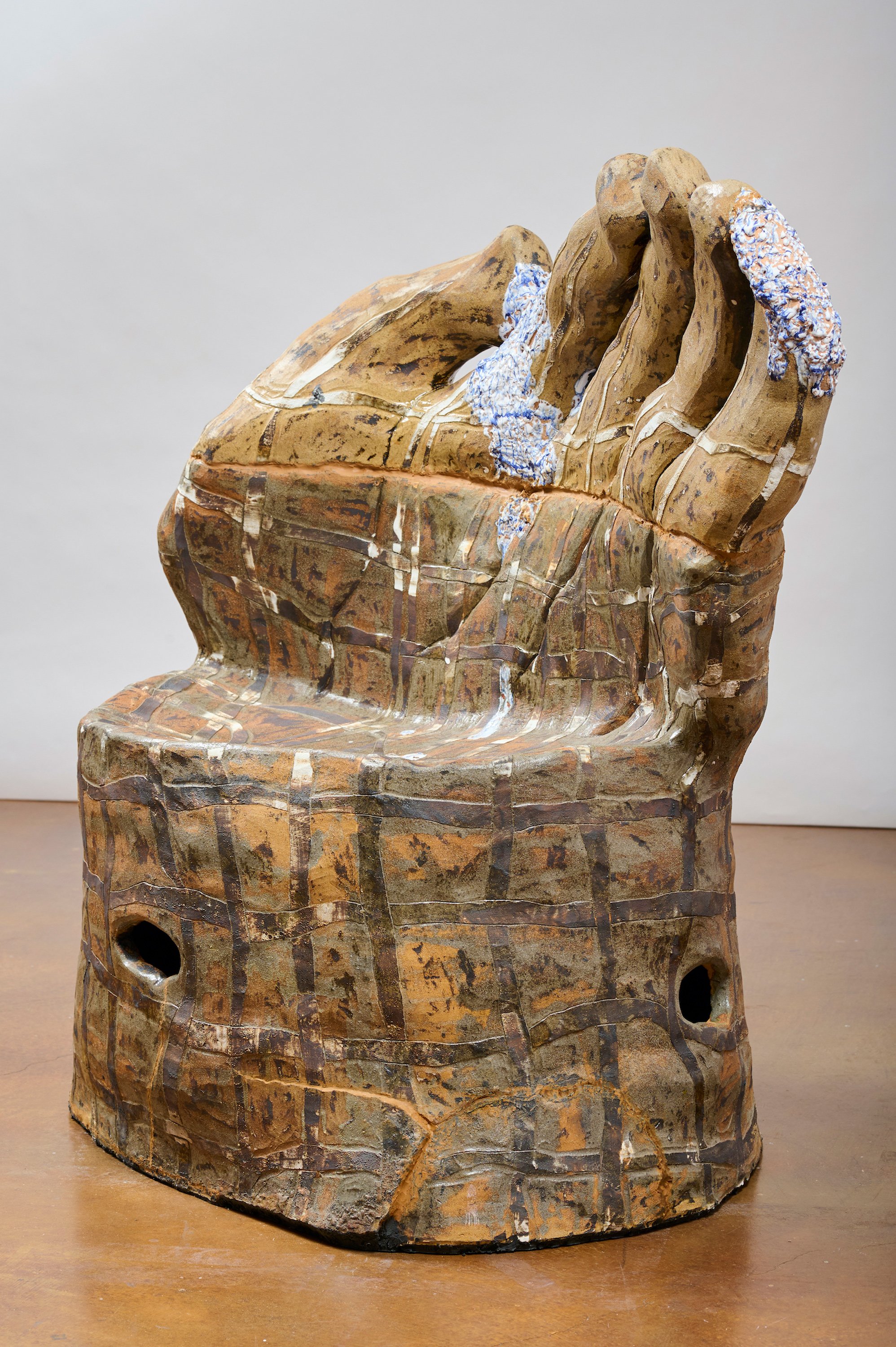 Julia Haft-Candell,  Hand Chair with Weaving , 2023, Fired clay, glaze, and bronze, 41 x 25 x 43 inches.