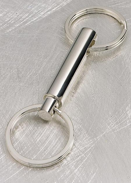 Cylindrical valet key in silver finish, spring loaded 22-2130