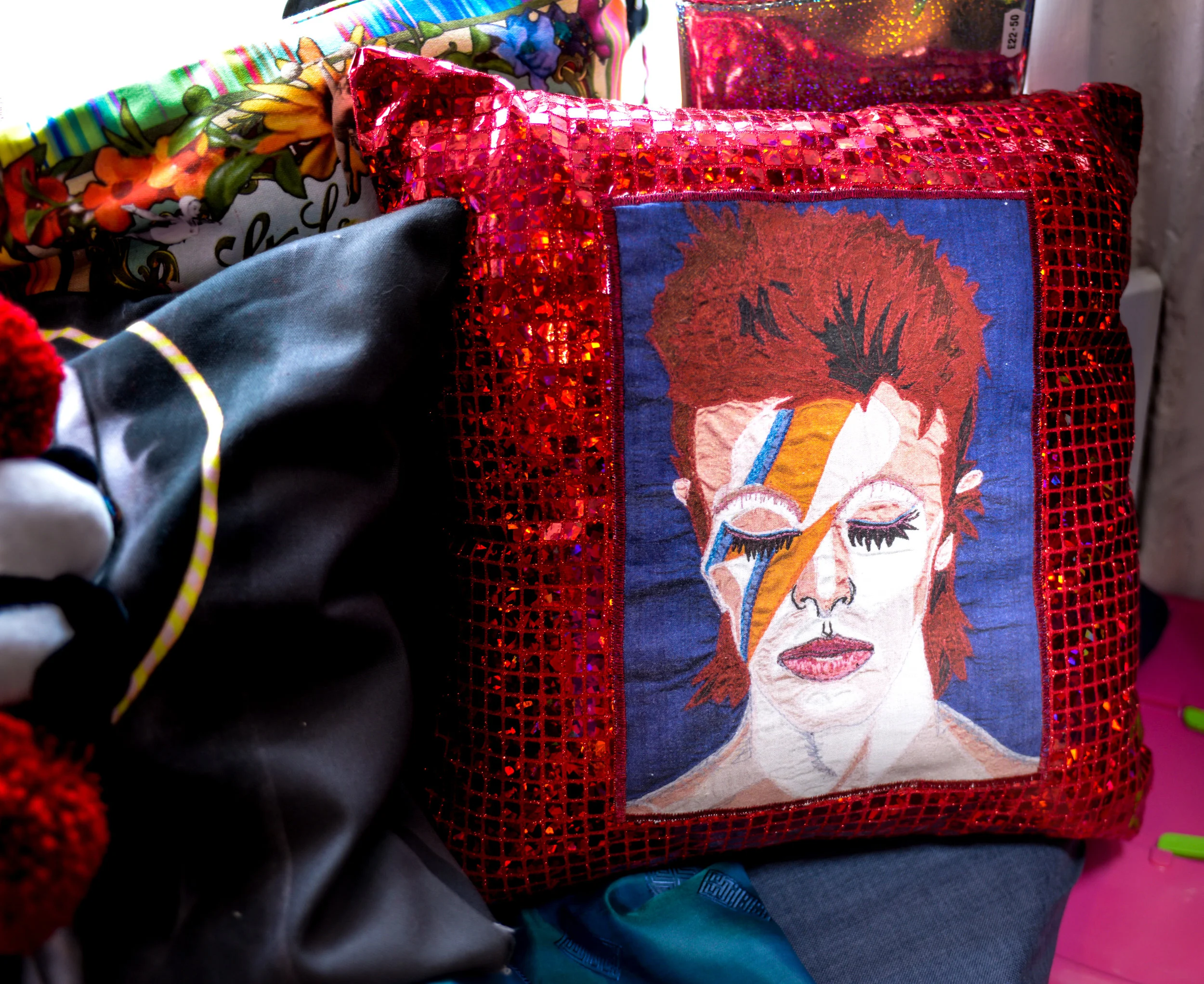 David red sequinned cushion.jpg