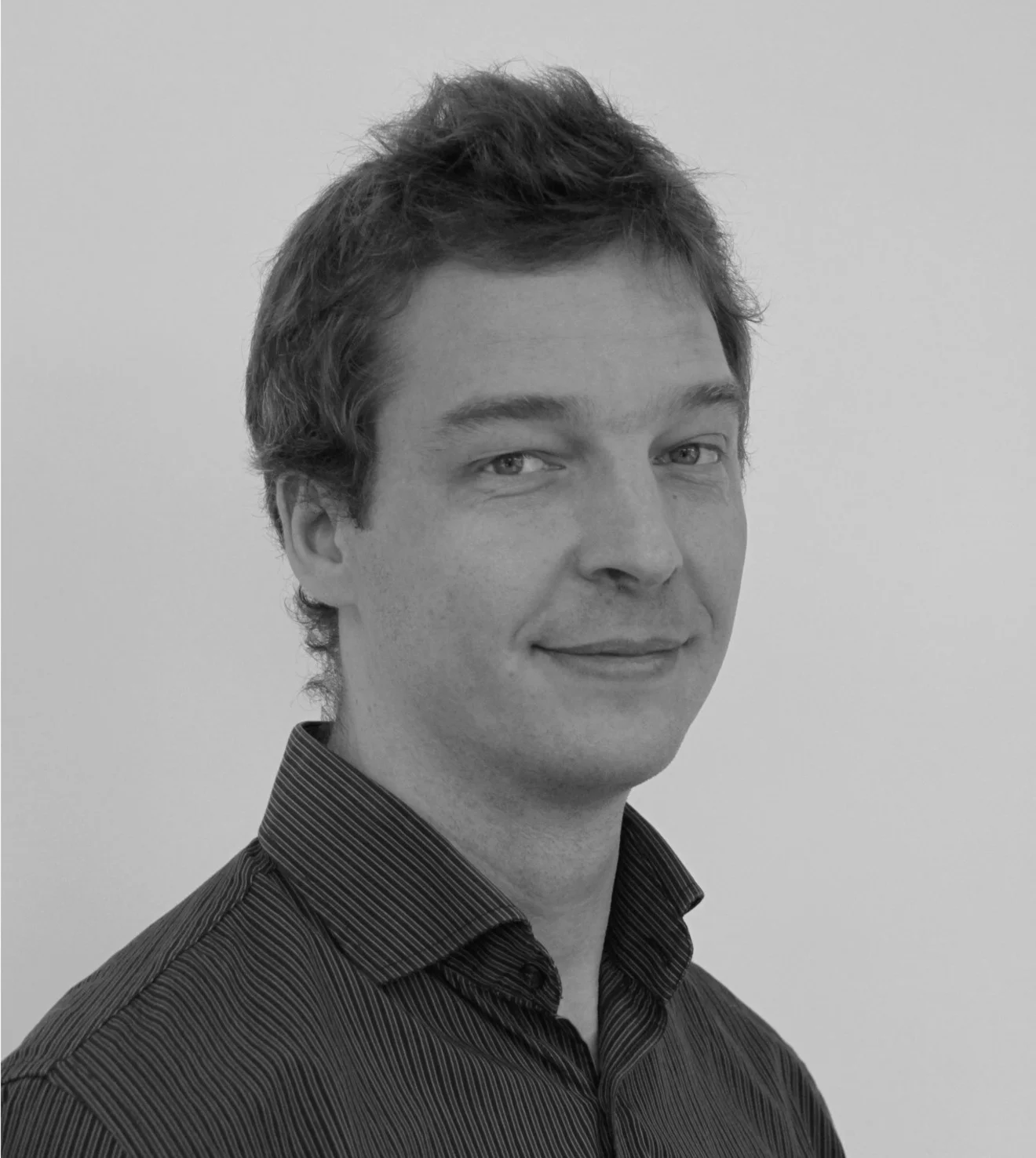 ClemensPreisingerHeadshot_bw.jpg