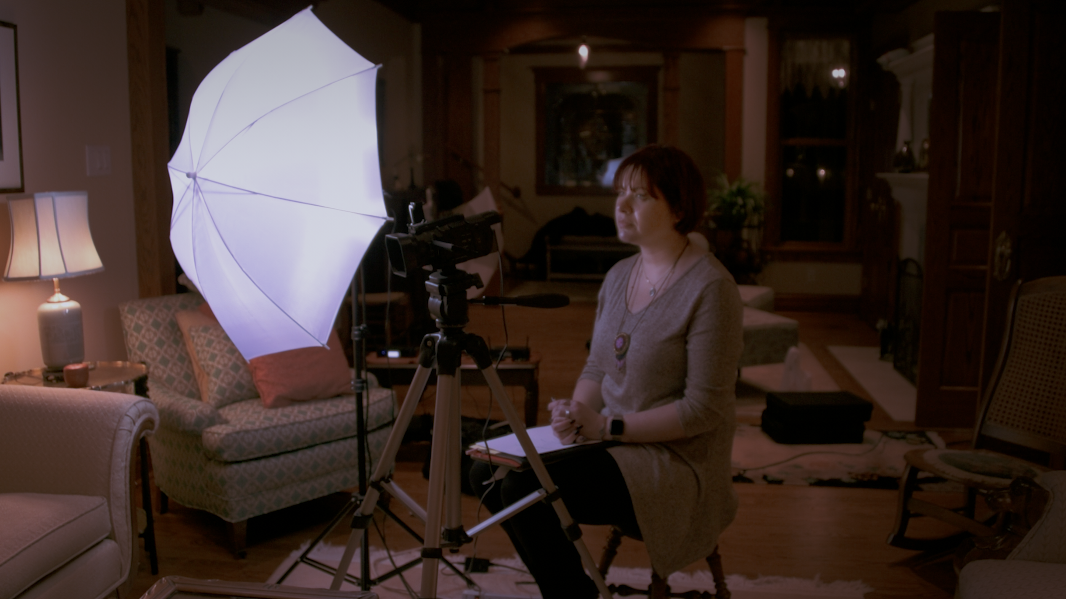 Our Producer, Nadia, conducting an interview on set.