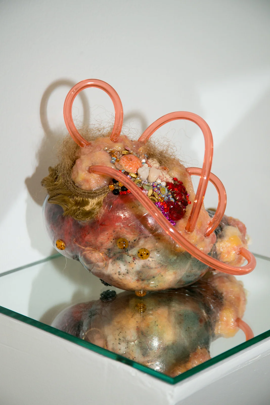 Doreen Garner, Onika (2014), glass, teeth, Swarovski crystals, hair weave, polyester fiber, glitter, petroleum jelly, 5 x 5 x 7 inches. Image courtesy of Larrie. 