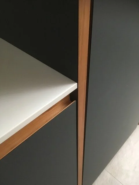 Bespoke cherry lipped kitchen with  Forbo furniture linoleum laminated fronts