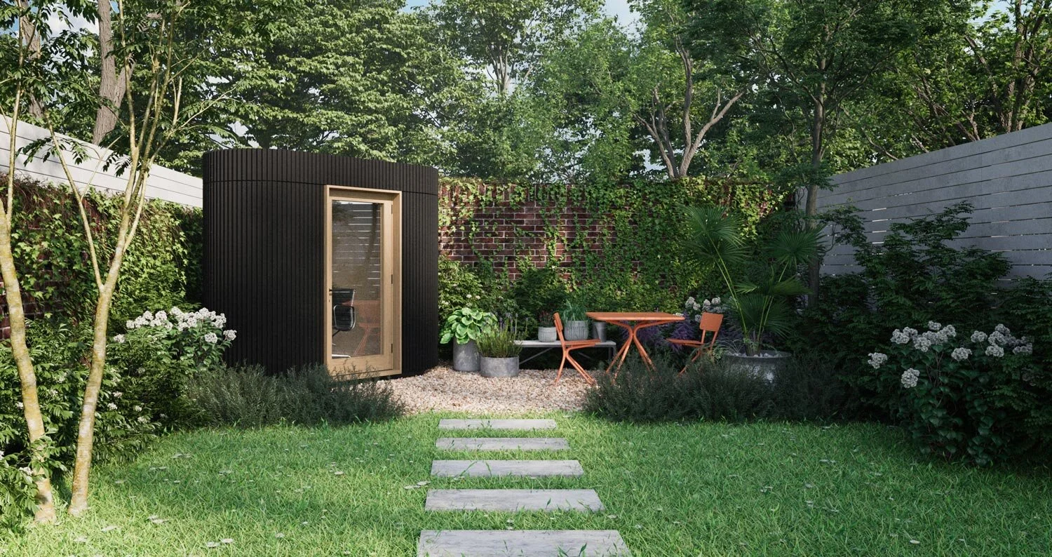 A black corrugated micro garden office by Lendel Stephens Architects