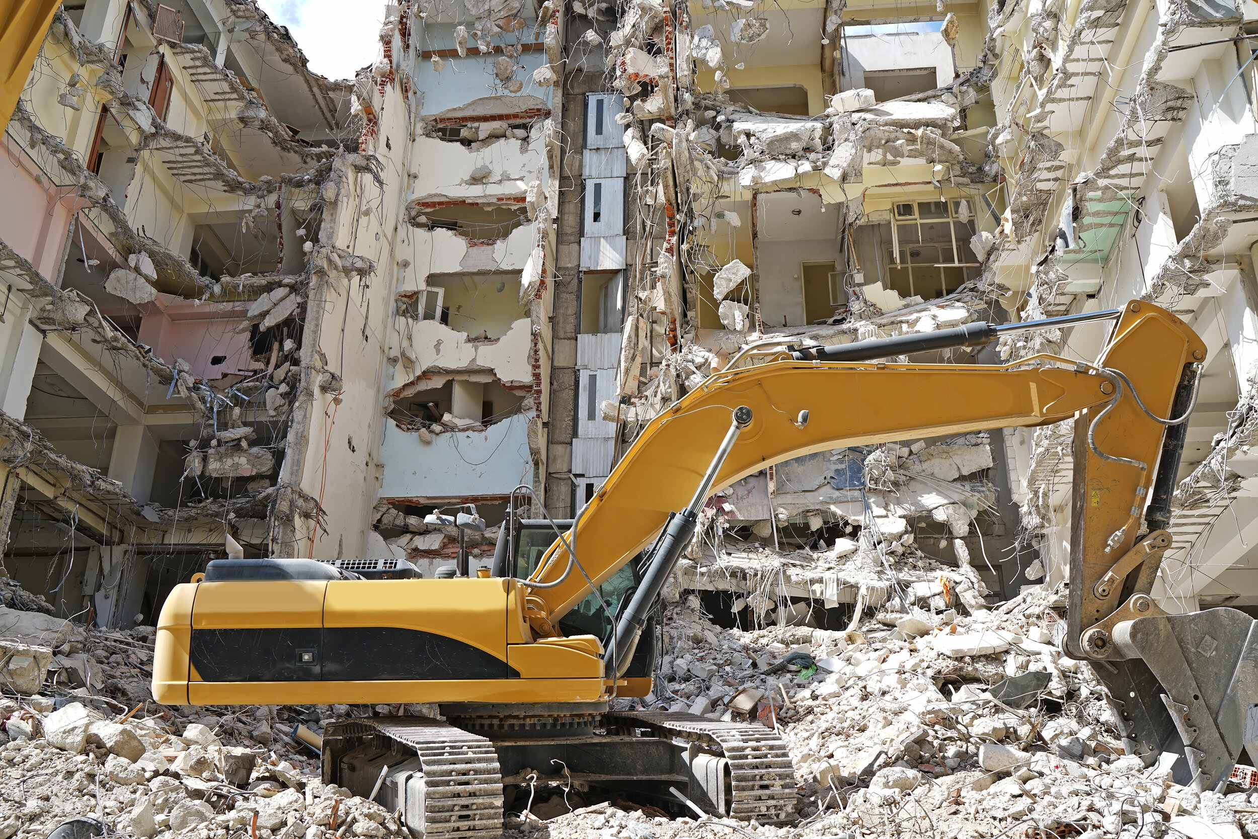 Bulldozer-in-the-demolished-building-341062.jpg