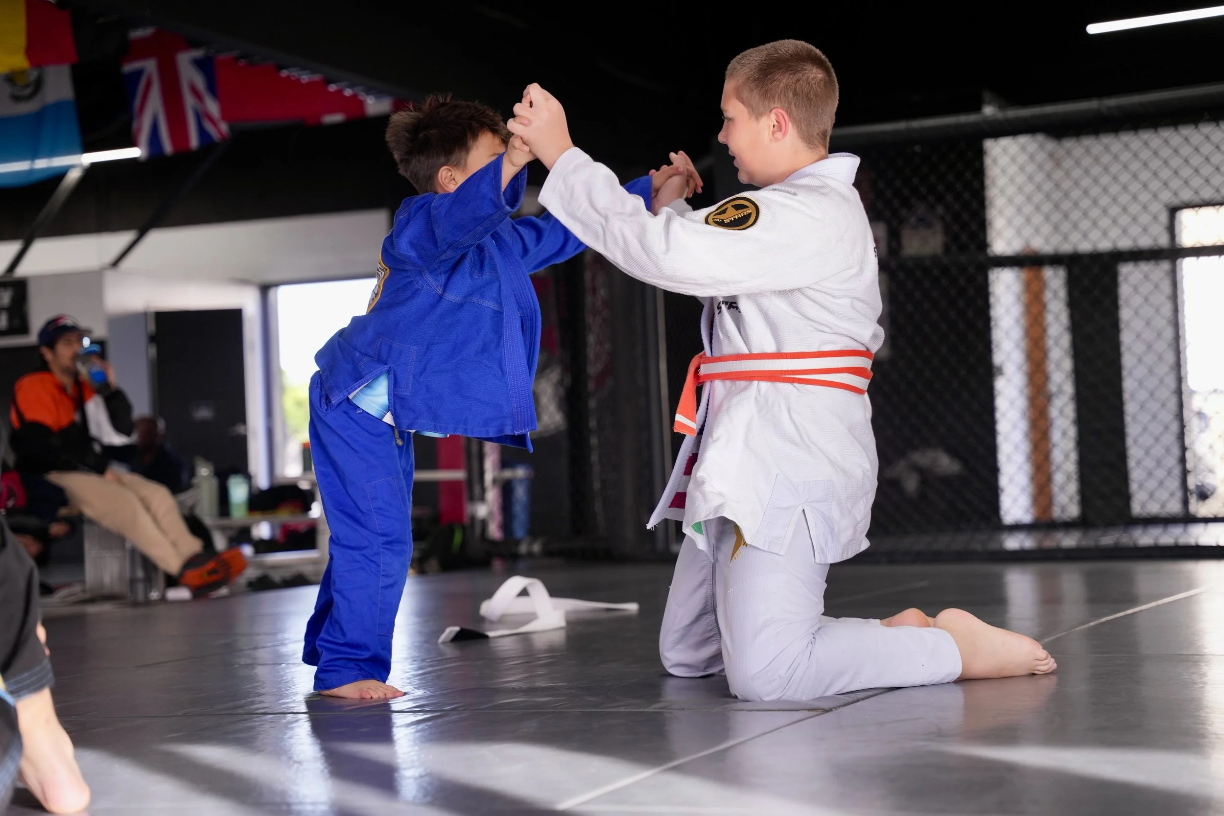 Our older kids learning leadership by helping out the younger guys. Just like someone did for them one day. The lessons repeat themselves! 

#jiujitsu #kingsmma #kidsjiujitsuclass #huntingtonbeach #martialarts