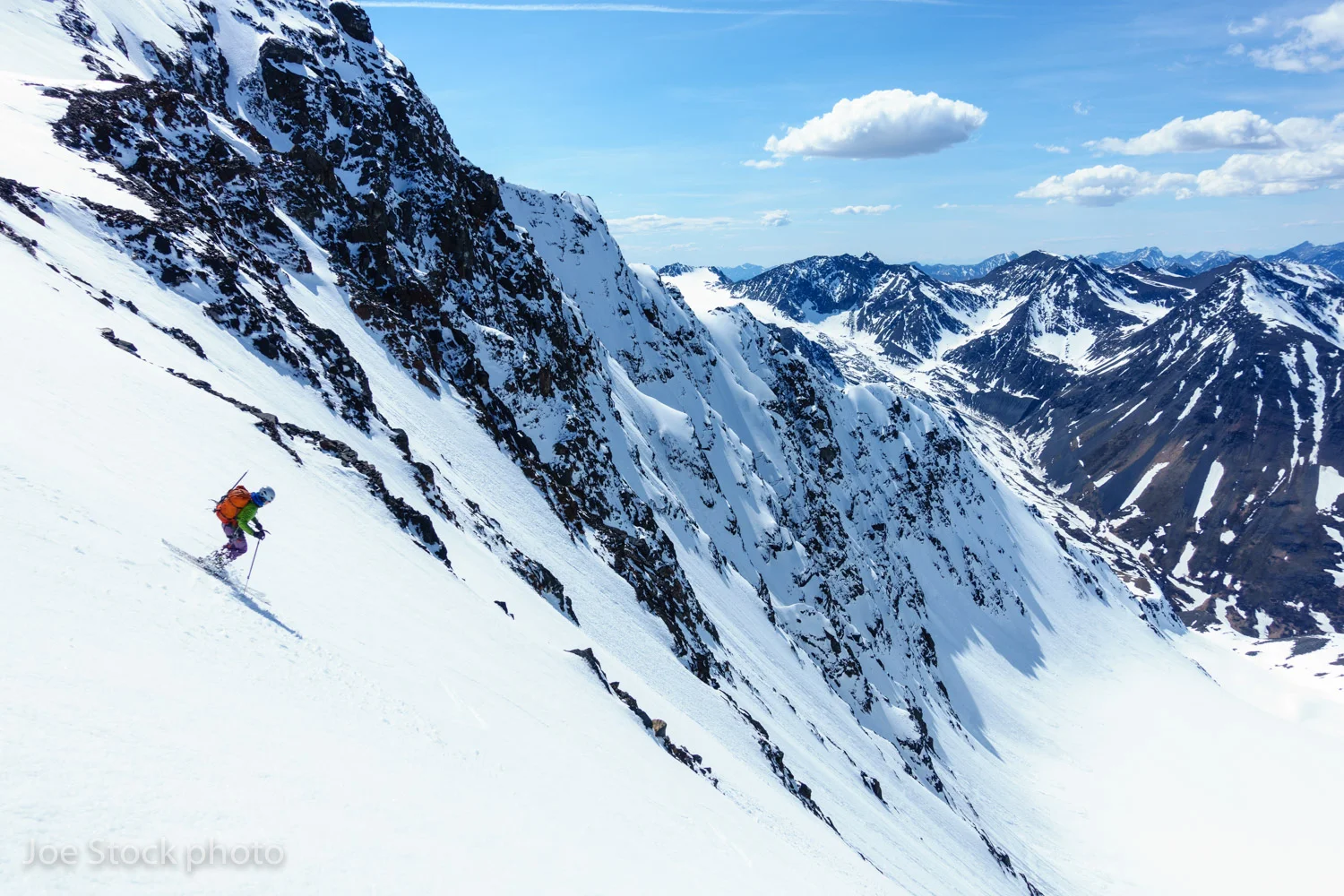 June 1, 2017. Last run of the year. Cortney Carman starting 1,000 vertical feet of 45-degree corn in the Western Chugach. Tobey, Cortney and I waited for two hours above this west-facing run. We snoozed and tossed pebbles to test how the crust was sun-softening into cream. Earlier in the day we skied 3,500 feet of north-facing powder to a different glacier's end.