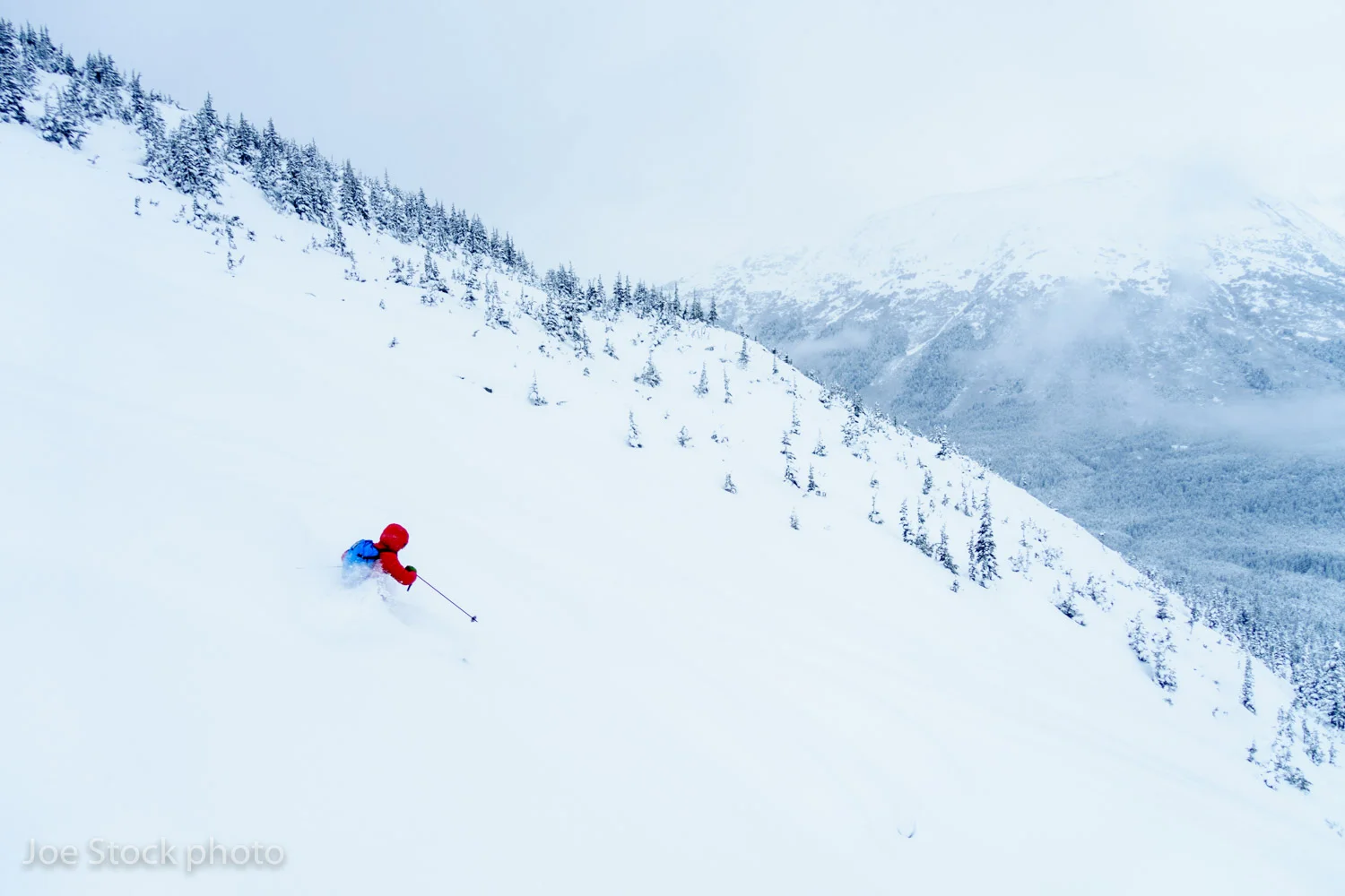 Jeff Conaway, scoops the goods from CPG at Notch Mountain near Girdwood in January. Deeeeeep!