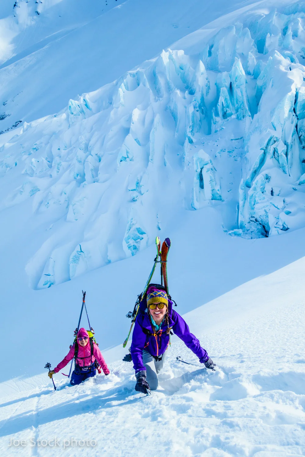 Cathy and Erika Birkeland booting to another glacier and powder-coated summit near Portage. Erika is a young ripper, who's tuned her skills at Bridger Bowl. This trip was her introduction to ski mountaineering—an instant addiction. On this day we were eating Kathy Still and The Viking's sloppy seconds. For après ski, we went to the Midnight Sun, and had beers with the legends who had schralped our pow. After the second beer, we forgave Kathy and The Viking for their tracks.