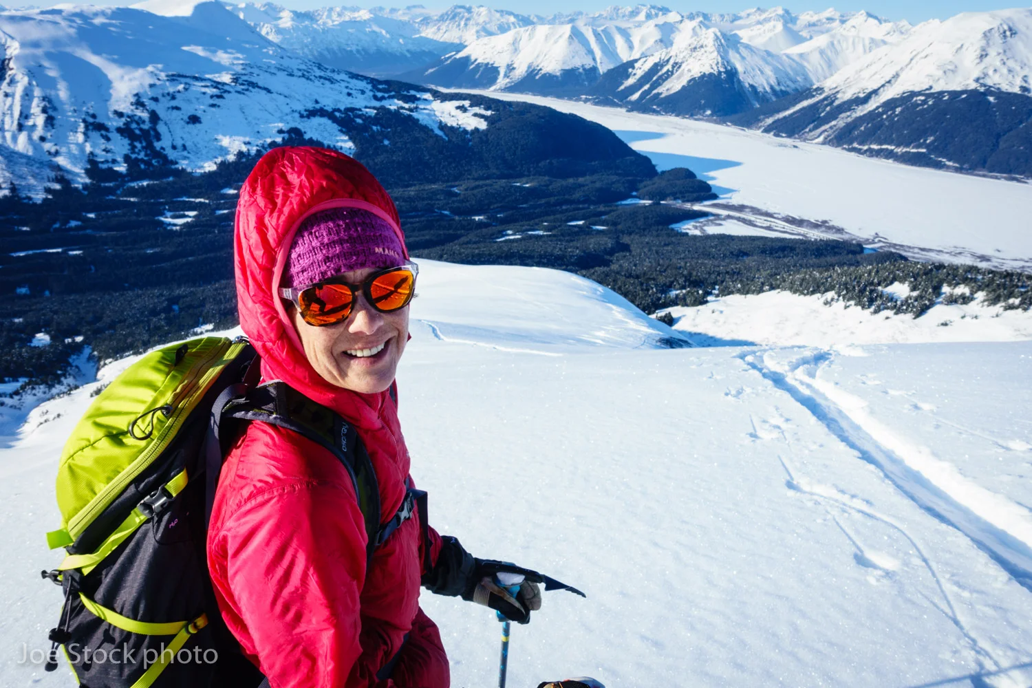 Cathy above the final 3,000 descent to Turnagain Arm on a linkup of Tincan, Eddies, Sharksfin and Worlverine Butte. This 9,000-vertical foot date with my wife was refreshing, like I'd been riding the La-Z-boy all day. As the years progress, and I become more work obsessed, I find the physical effort of skiing easy in comparison to the mental effort I put into guiding.