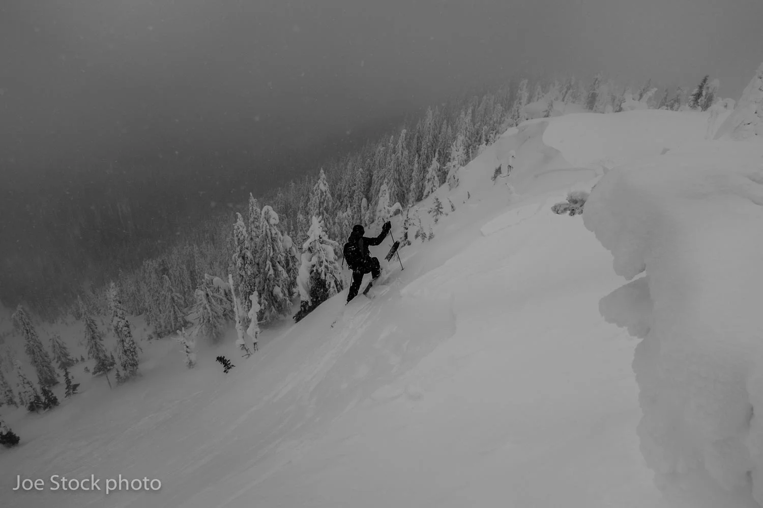 Keith Bobine ski cuts a size 2 on the east face of Mount Mackie, Kootenay Mountains, British Columbia.