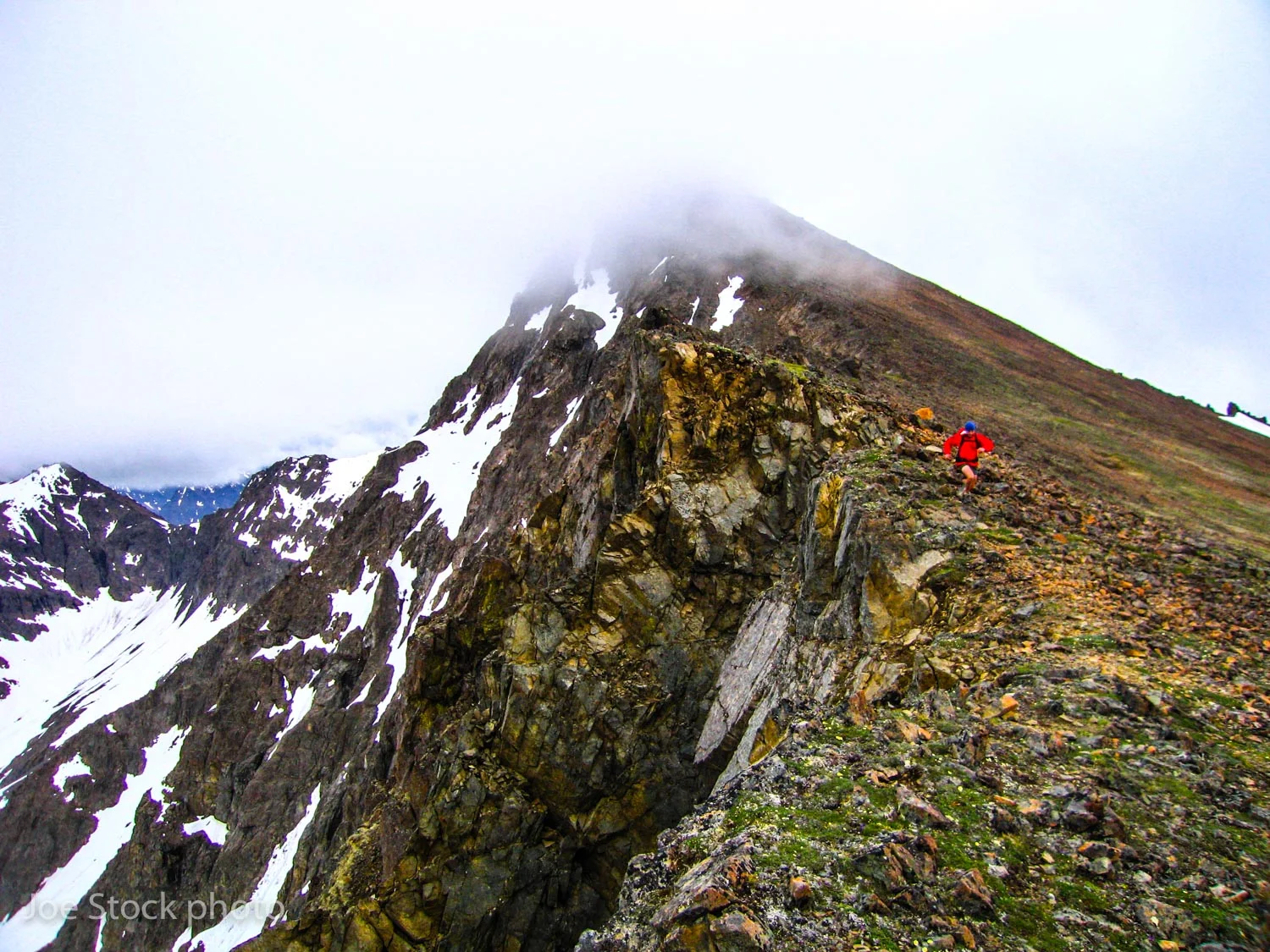 Some of the route is on open ridgelines, perfect for running. Andrew McCarthy on a route finding run in June.