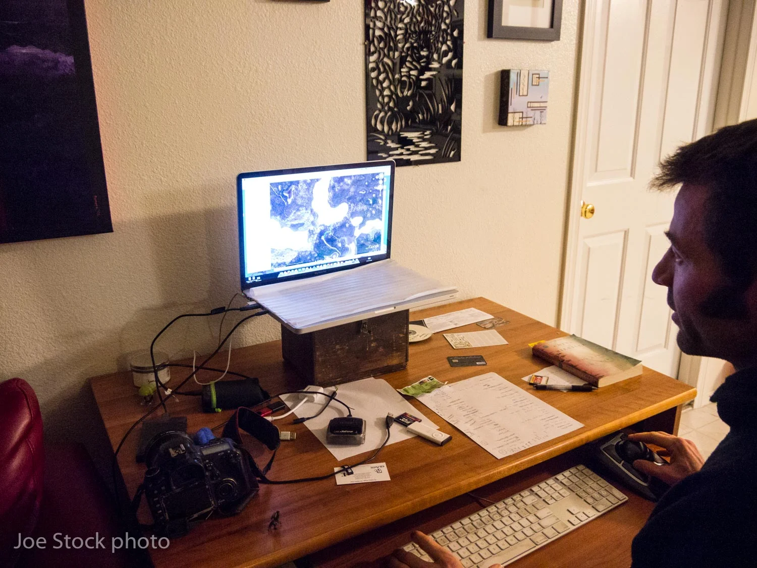 My neighbor and friend Luc Mehl planning his annual spring ski trips in Alaska.