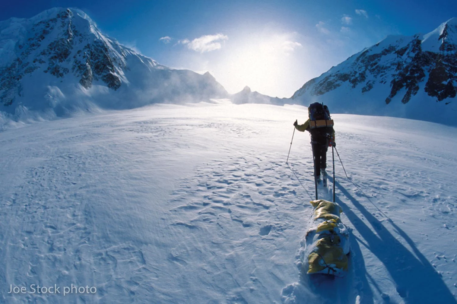 Dylan sledging up the Valdez Glacier toward Cacheman Col on day two.