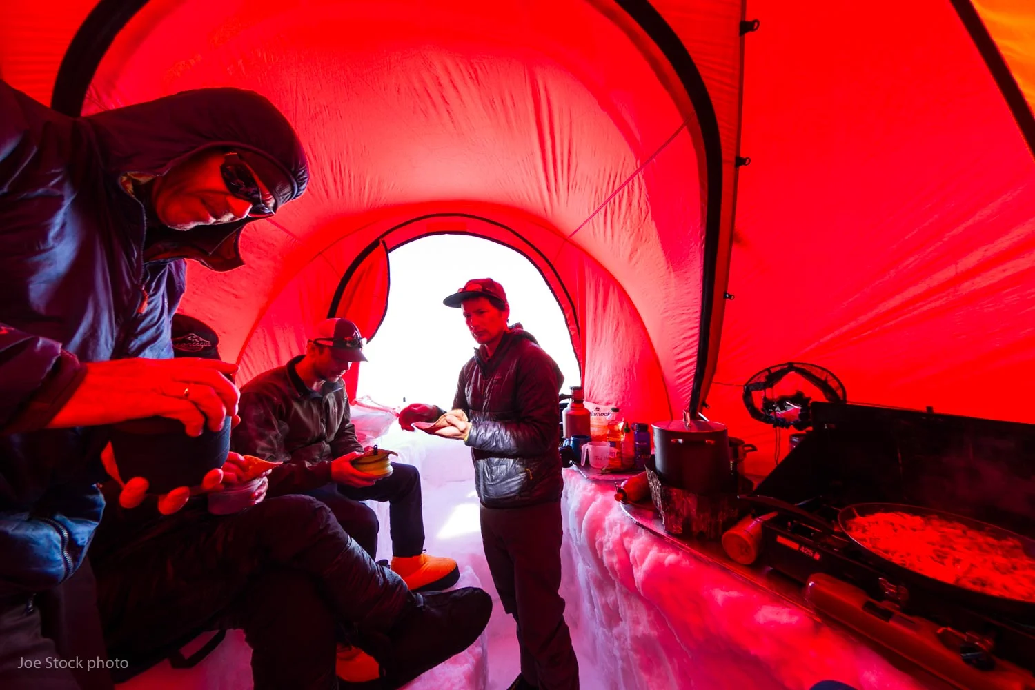 Elliot working the base camp kitchen of our six-person Hilleberg Atlas.