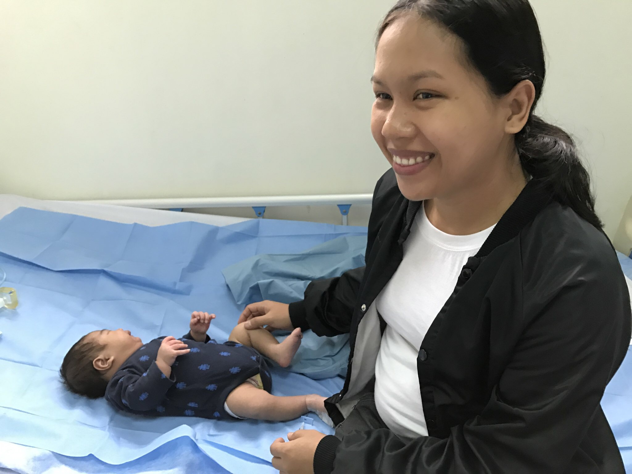 PMAM - Mom and baby patient on bed.jpeg