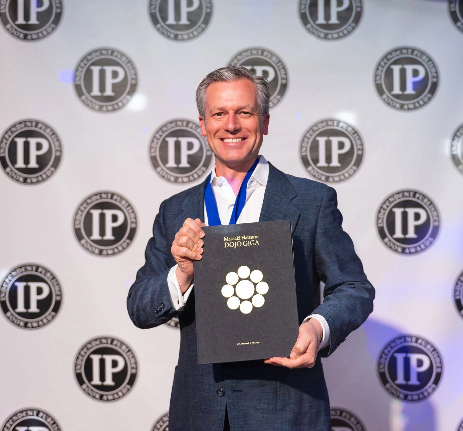 Steve Olsen (writer and publisher) traveled all the way from Japan to receive the gold medal at the 23rd annual Independent Publisher Book Awards ceremony in New York City on May 28, 2019.