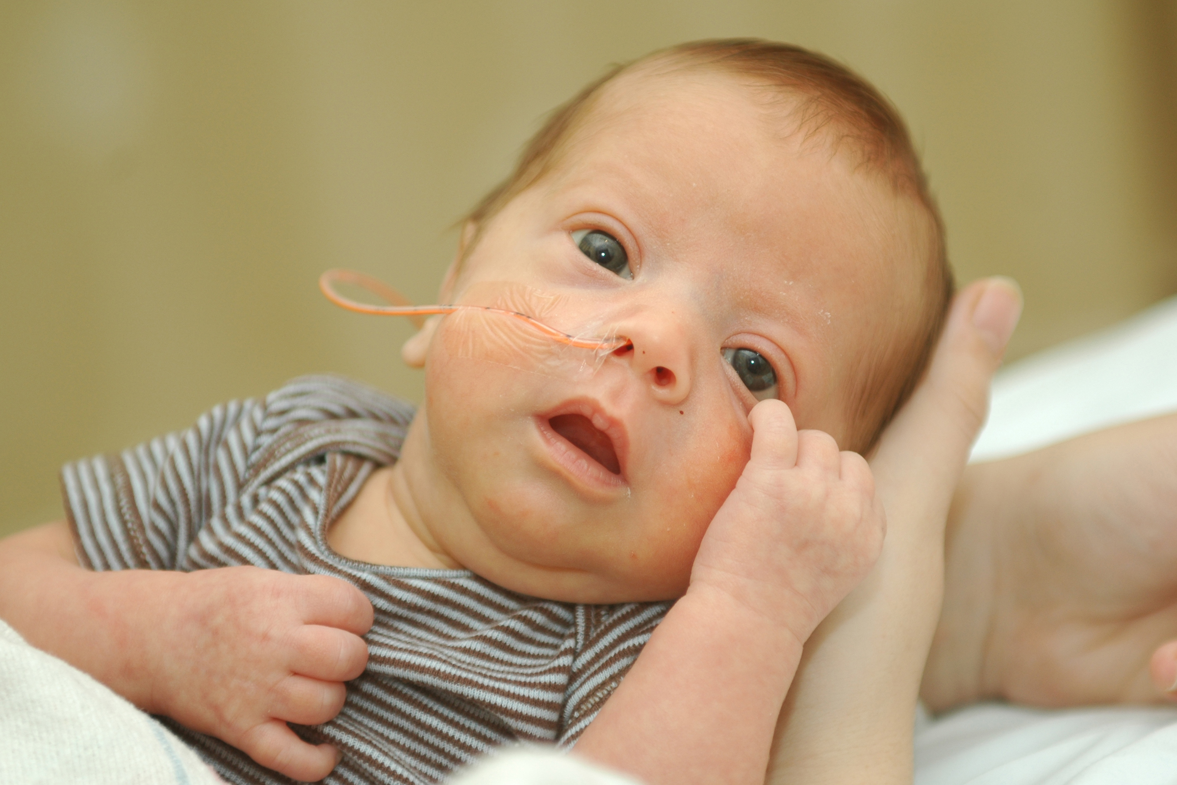 Premature-baby-boy-with-a-hand-cradling-his-head-152505452_2400x1600.jpeg