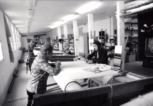 June Wayne working alongside master weavers in France