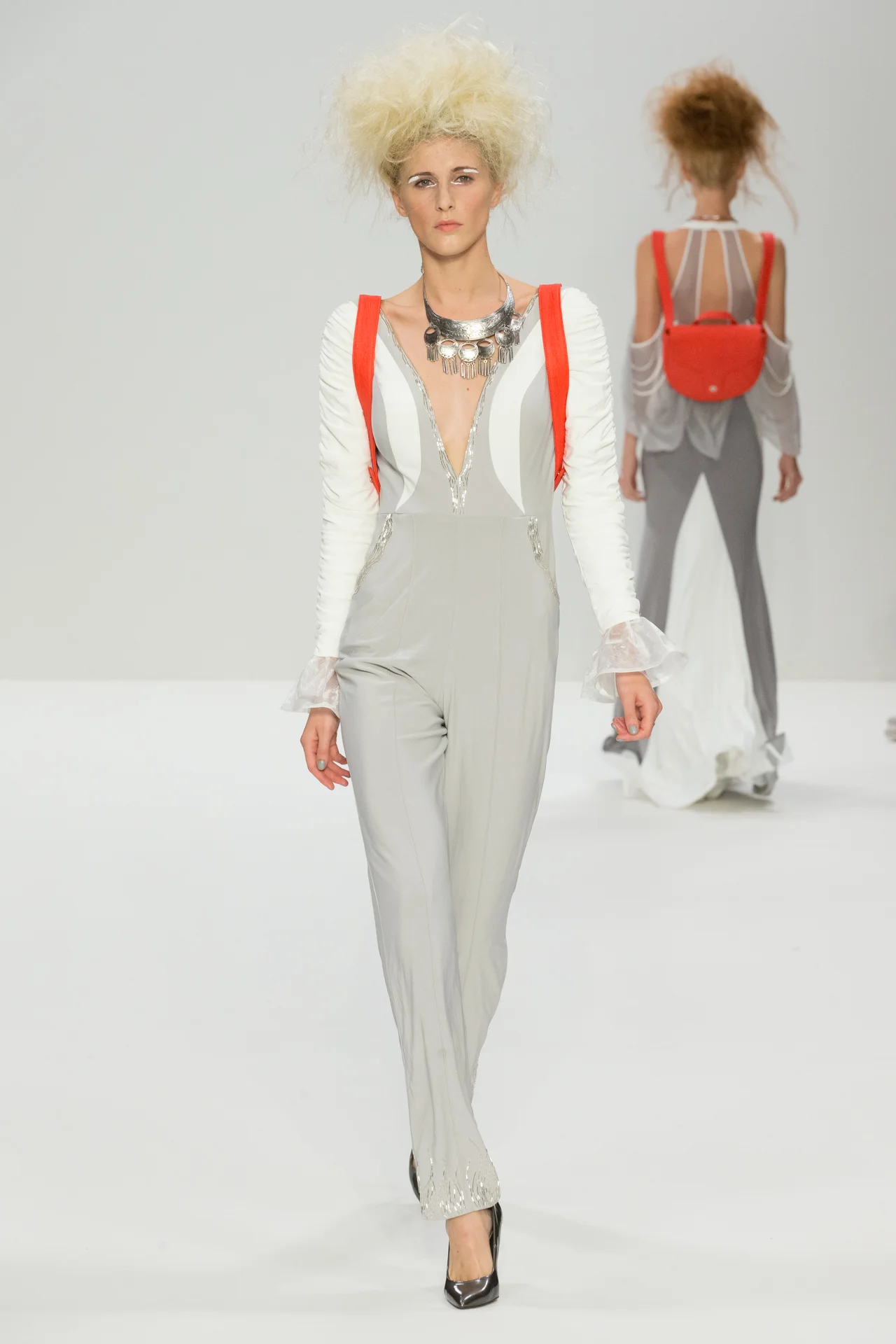 JUMPSUIT: RACHEL ALLEN PIÑATEX PINEAPPLE BAGS: C. NICOLE
