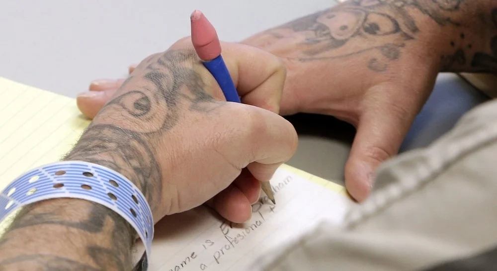 TattooWritingHands.jpg