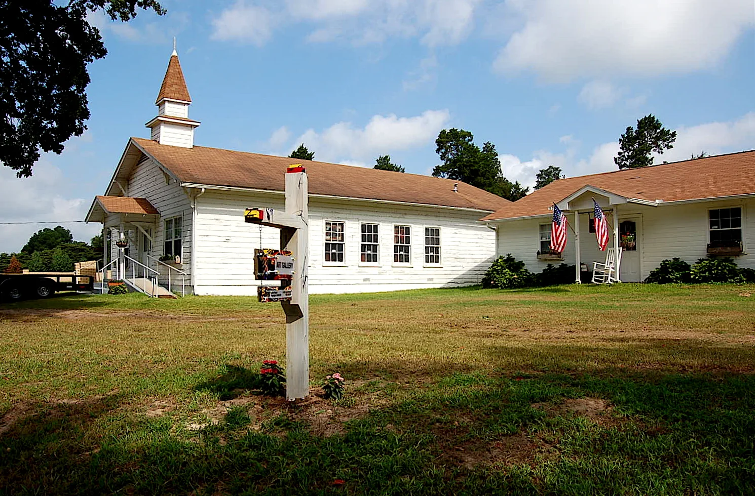 The studio grounds include a church as well as the structure which houses the studio.