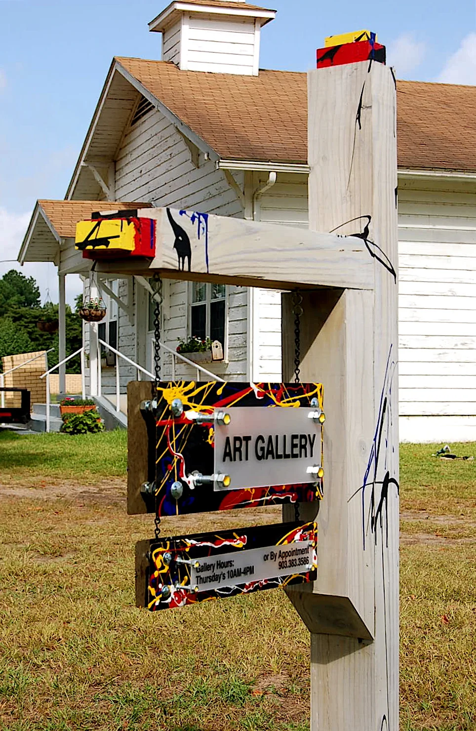 The signpost speaks - "..there is art here..."