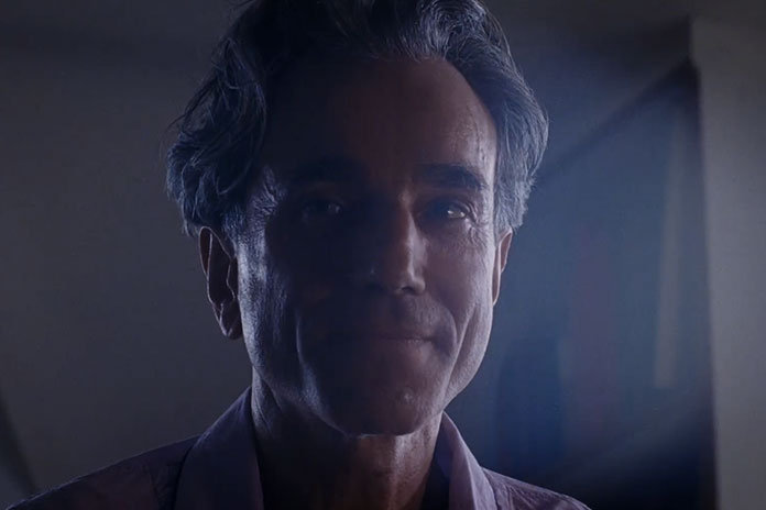 Daniel Day-Lewis as Reynolds Woodcock playing his new Nintendo switch.