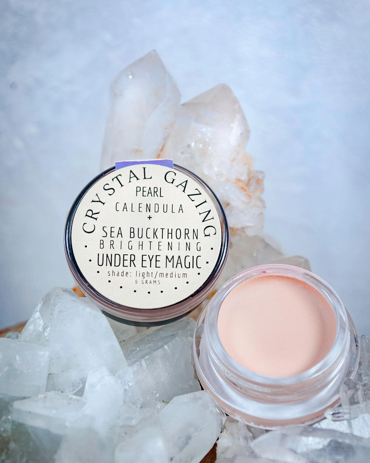 Did you know we added a second shade to our top selling makeup magic balm, the Crystal Gazing Eye Brightener ?  Grab your 5 dollar compostable sample from the shop now and give it a try🪞✨🧚🏽&zwj;♂️💧
.
.
.
This corrective + concealing eye treatment