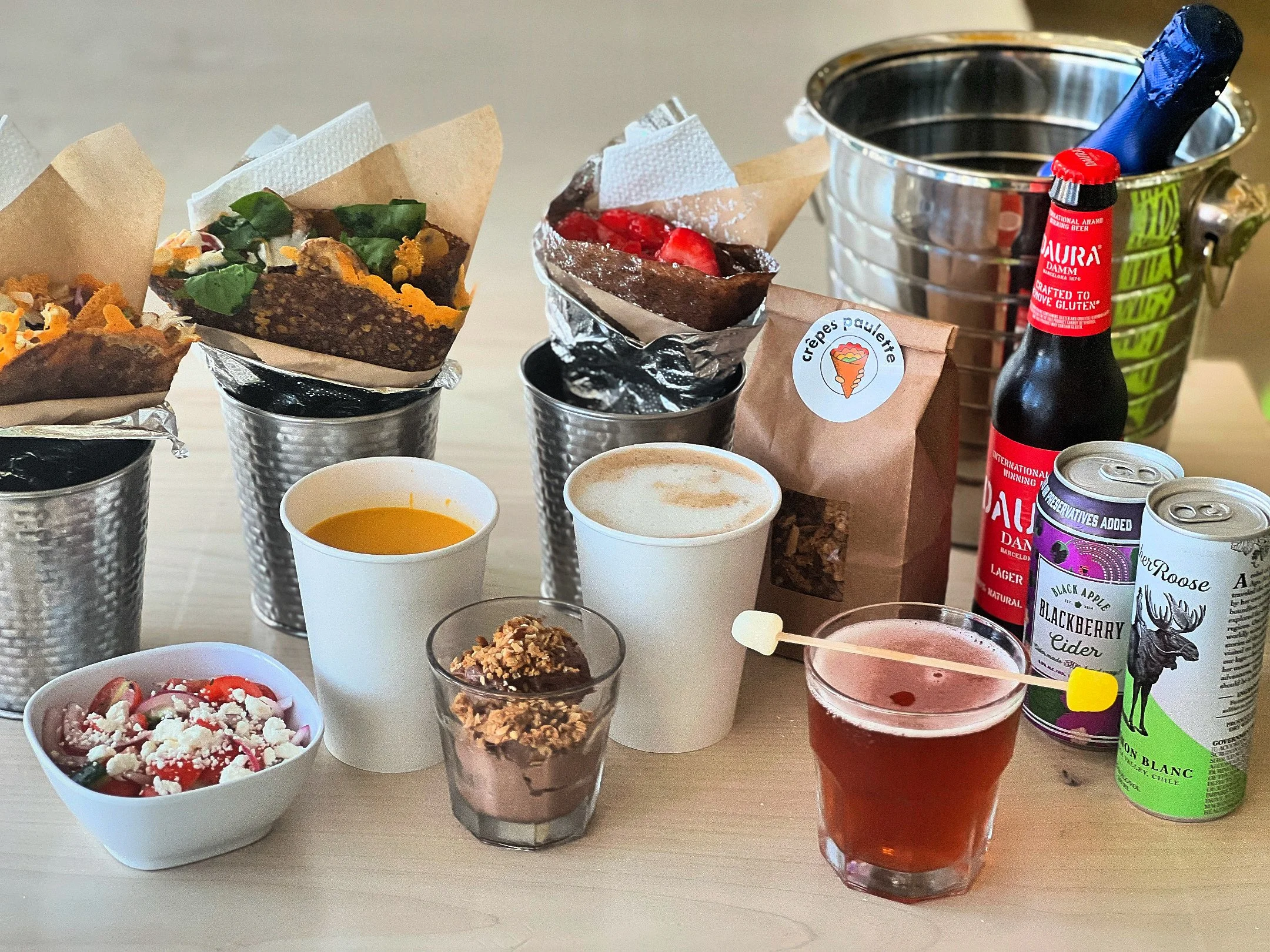Crepes Paulette menu items: handheld crepes, lattes, desserts, mimosas, ciders, soups, beers