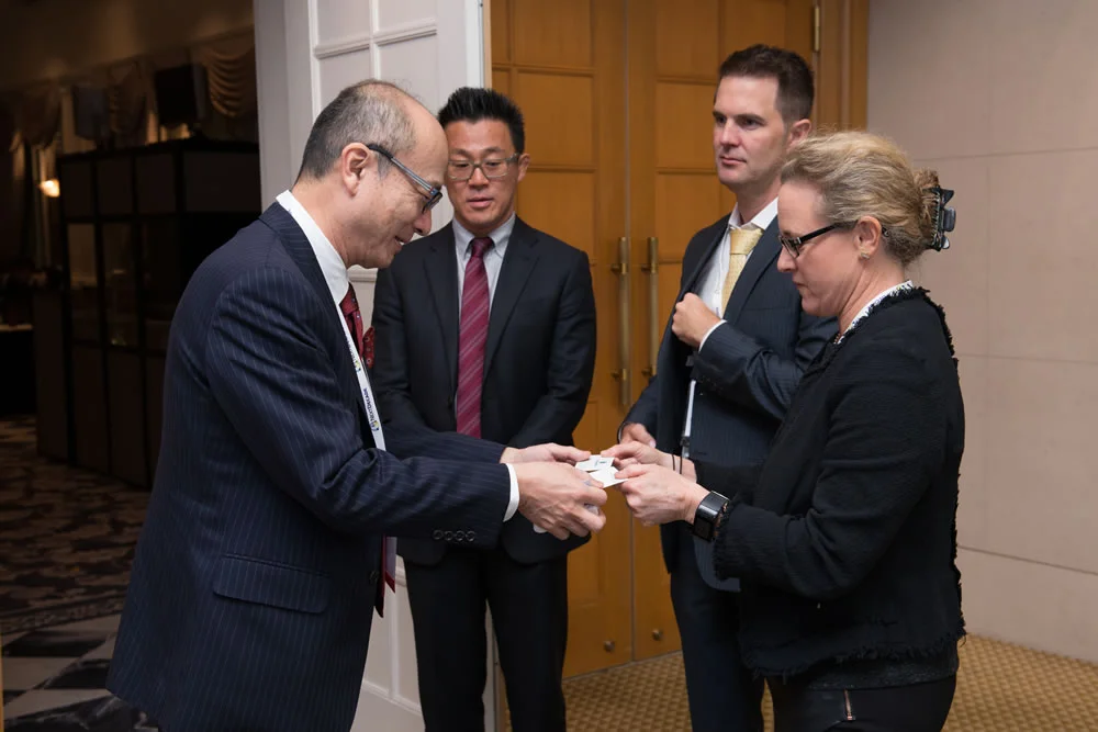 Anna exchanging name cards with Kakimi-san.jpg