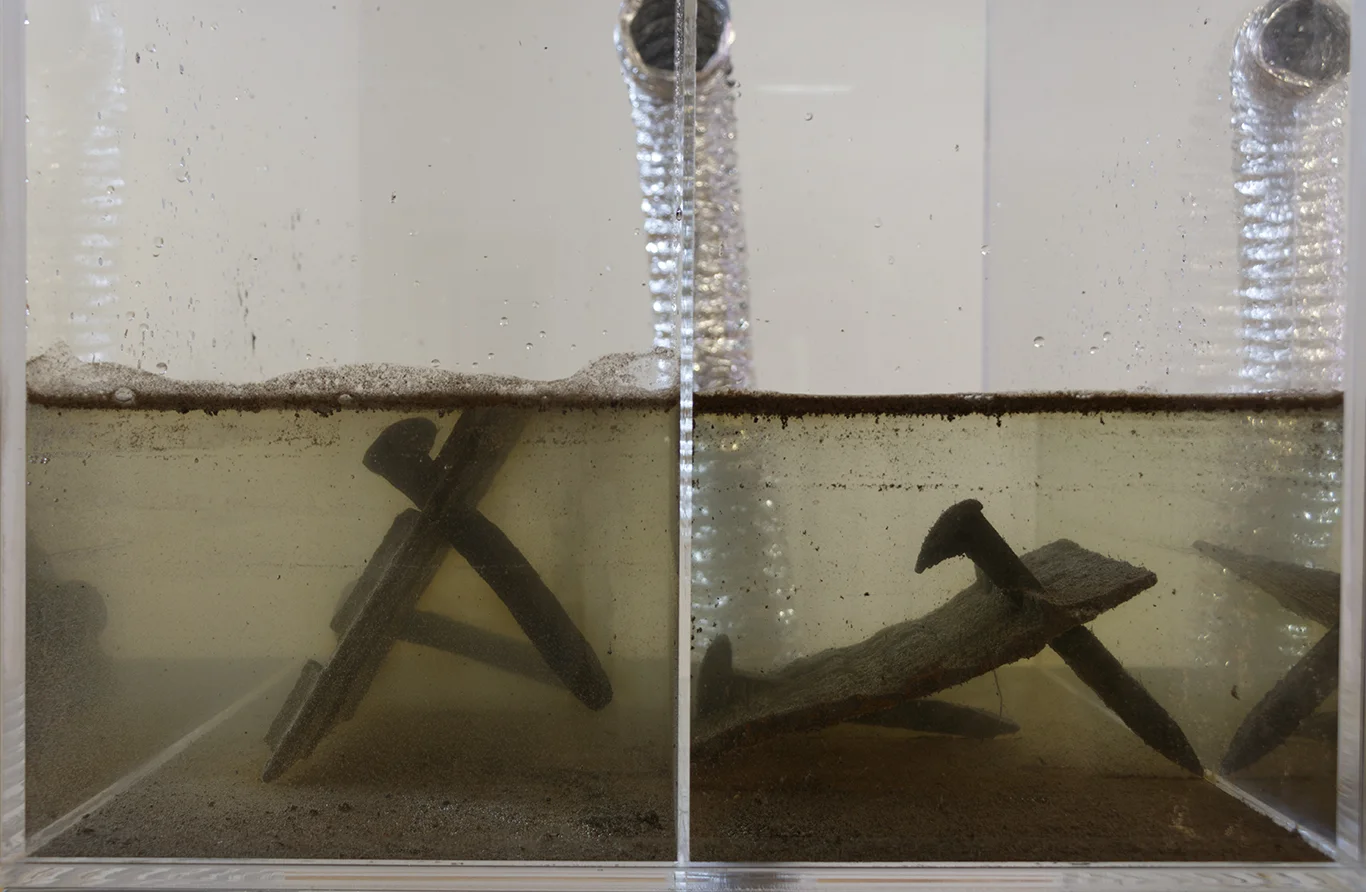 detail: plexiglas, artifacts from Sinclair Meatpacking Plant, sulfuric acid.