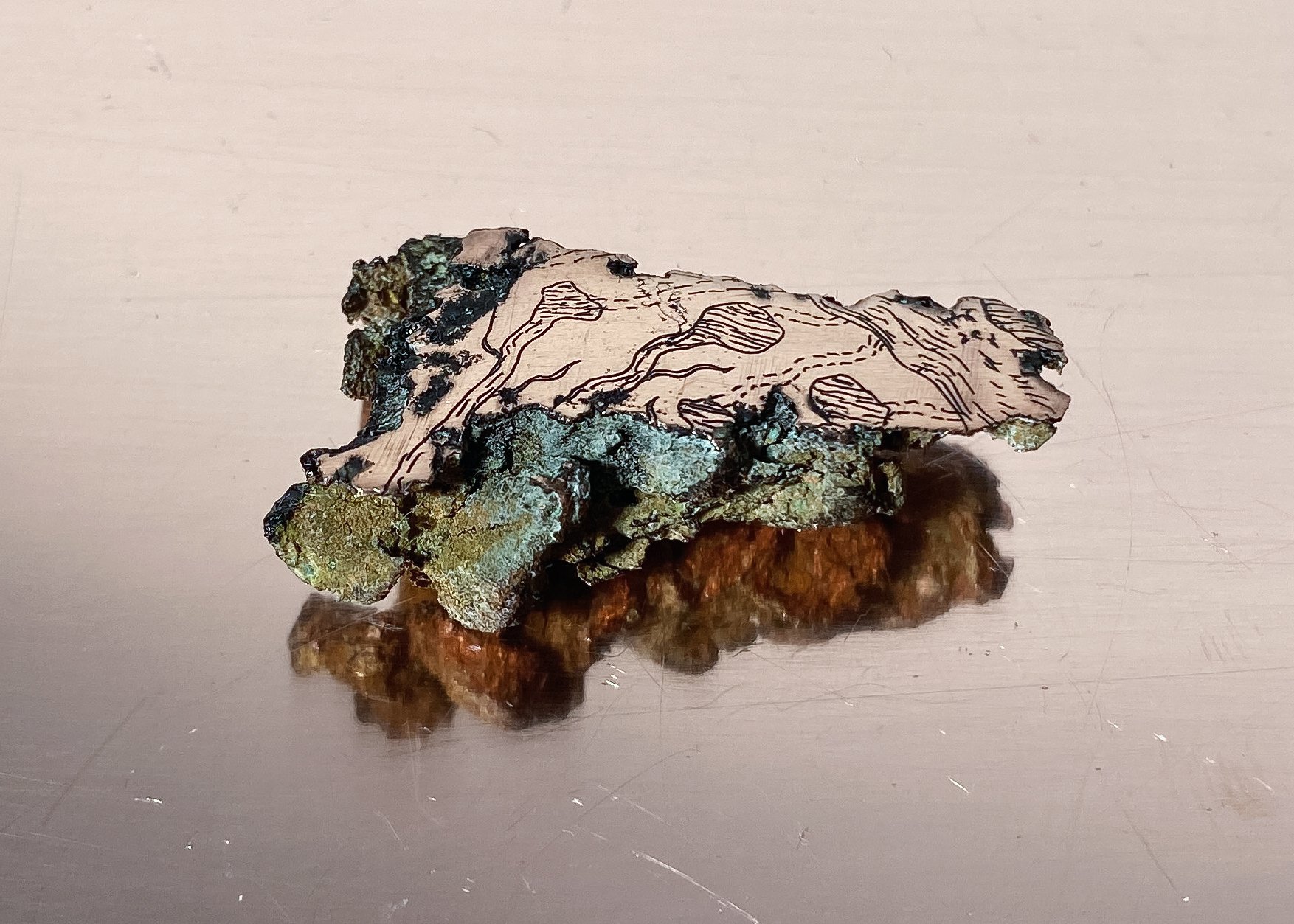 The formgiving forces enthroned on earth, while the growing metals make music in the cave (sample no. 8), polished and etched float copper (excavated from Cliff Mine tailing piles, Keweenaw Peninsula), 2021.
