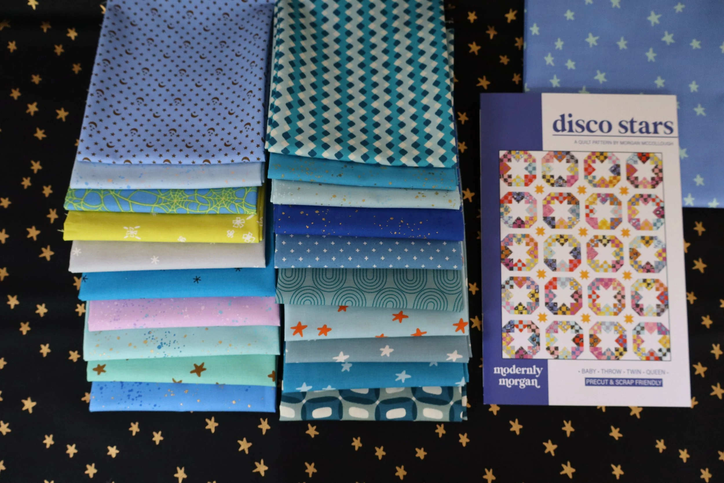 Disco Stars Glassy quilt kit featuring Ruby Star Society fabrics in blue and green — modern quilt pattern by Modernly Morgan.