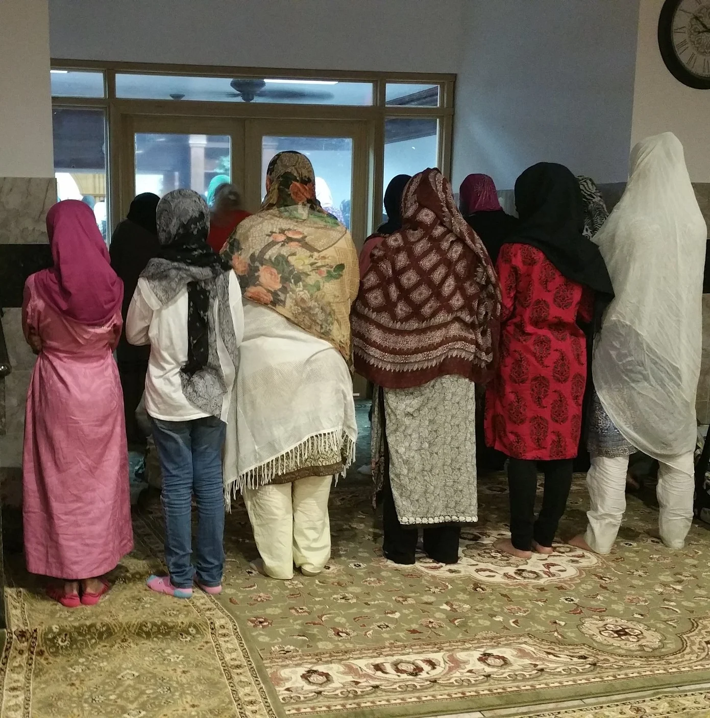 Friends praying in the masjid together during Ramadan