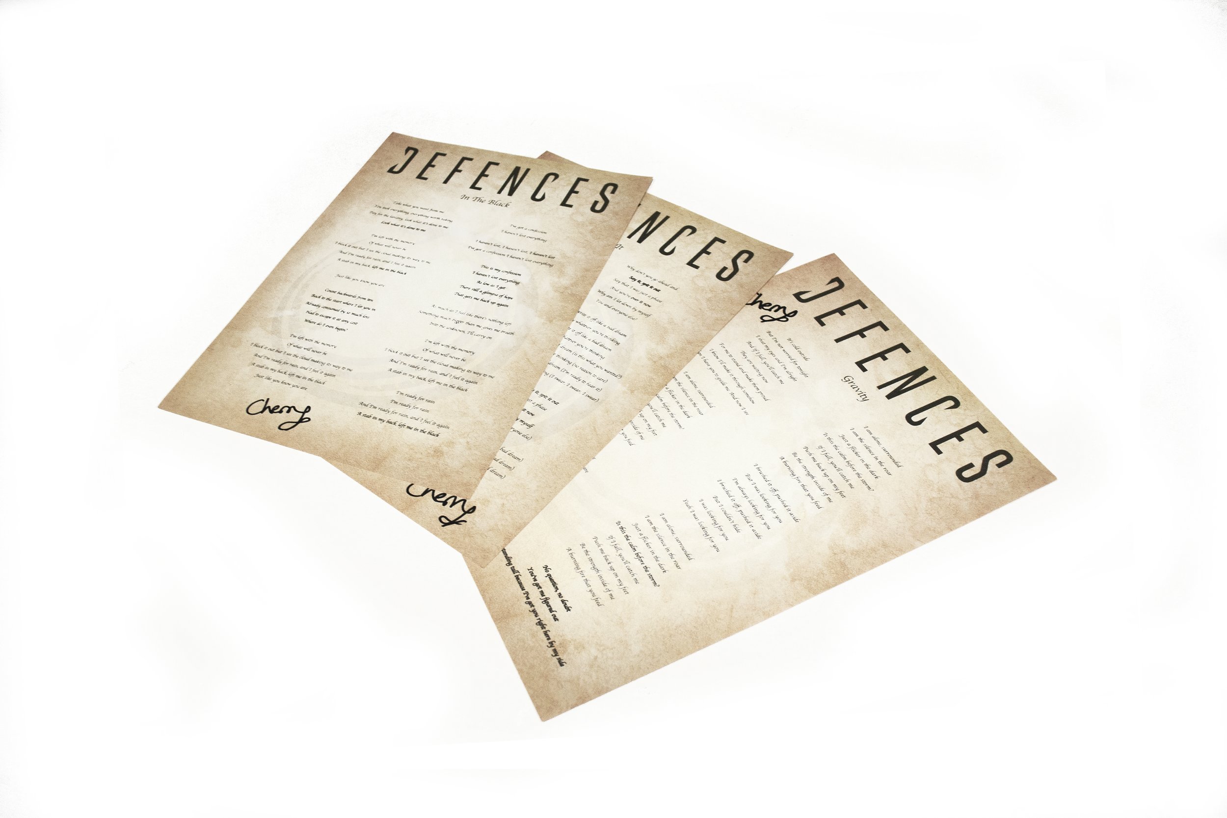 Defences - Signed Lyric Sheets.jpg