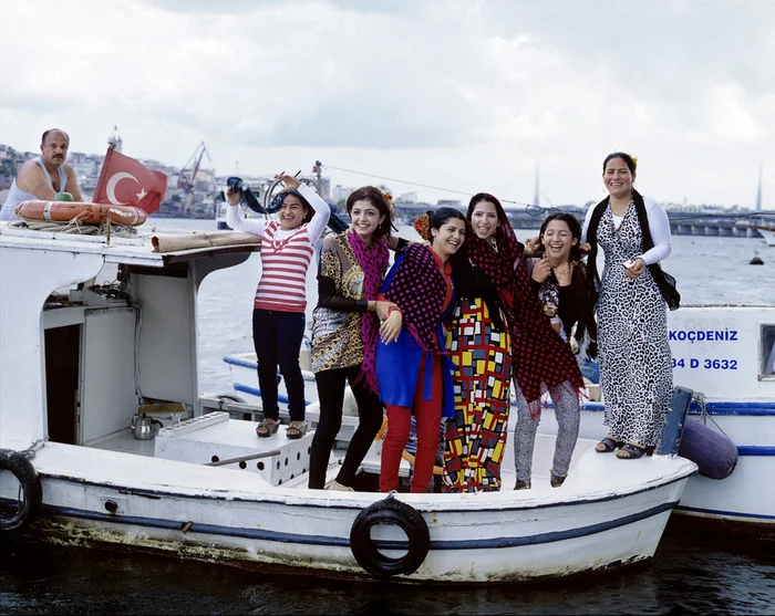 We heard music first and then saw a boat in the middle of the Golden Horn with seven figures on it - all dancing and singing. It was an amazing sight. So full of joy. I just hoped they were coming to shore sometime soon near me.