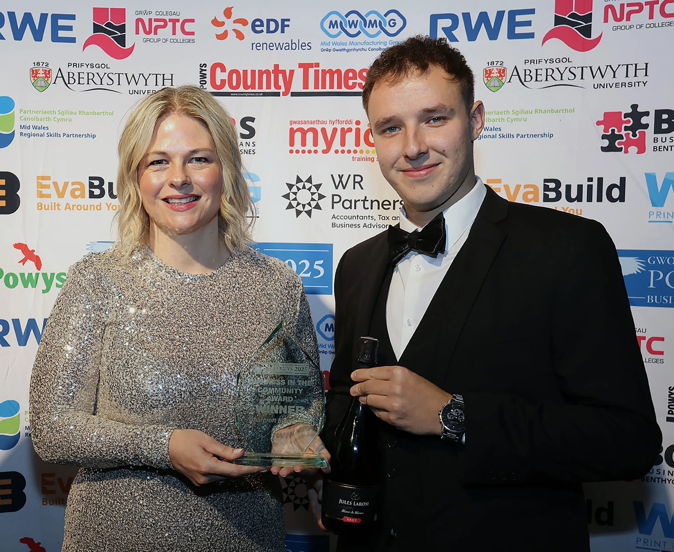 Vicky Mellor and Ryan Brown (right) from Charcroft Electronics with the 2025 Powys Business in the Community Award. This year, the company is a finalist for the International Trade and Growth Awards.