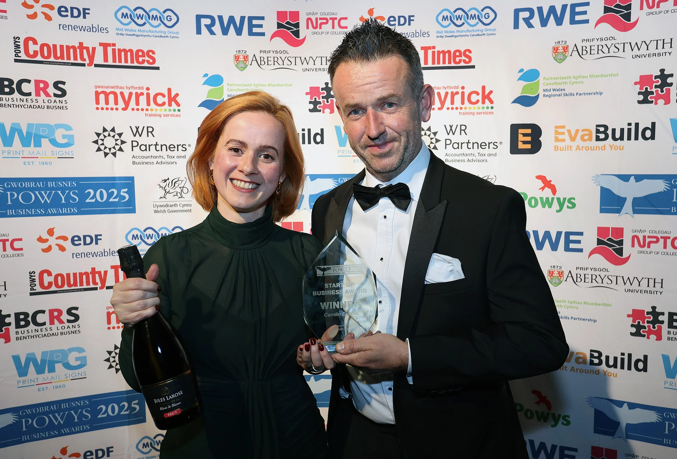 Camlin managing director Elinor Camlin receives the 2025 Powys Start-up Business Award from Nick Evans from EvaBuild, sponsor. This year, the company is a Micro Business Award finalist.